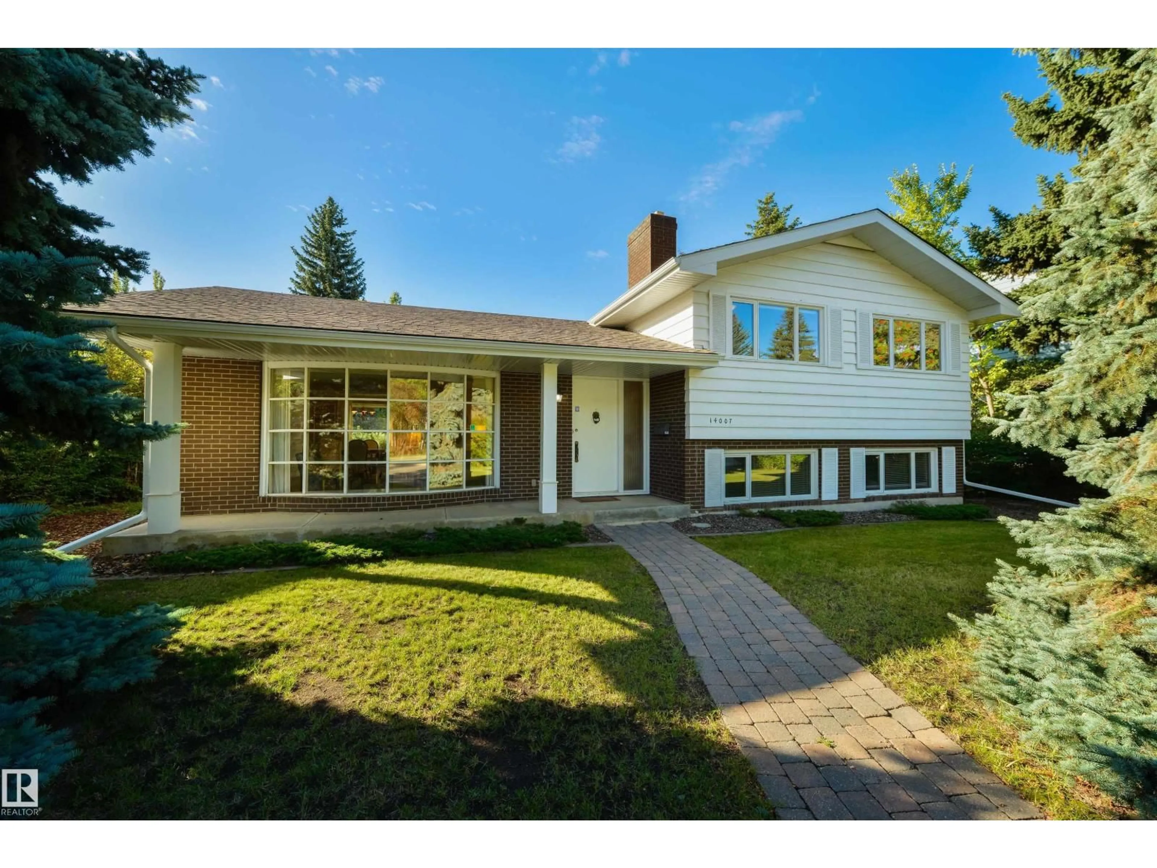 Home with brick exterior material, street for NW - 14007 53 AV, Edmonton Alberta T6H0S9