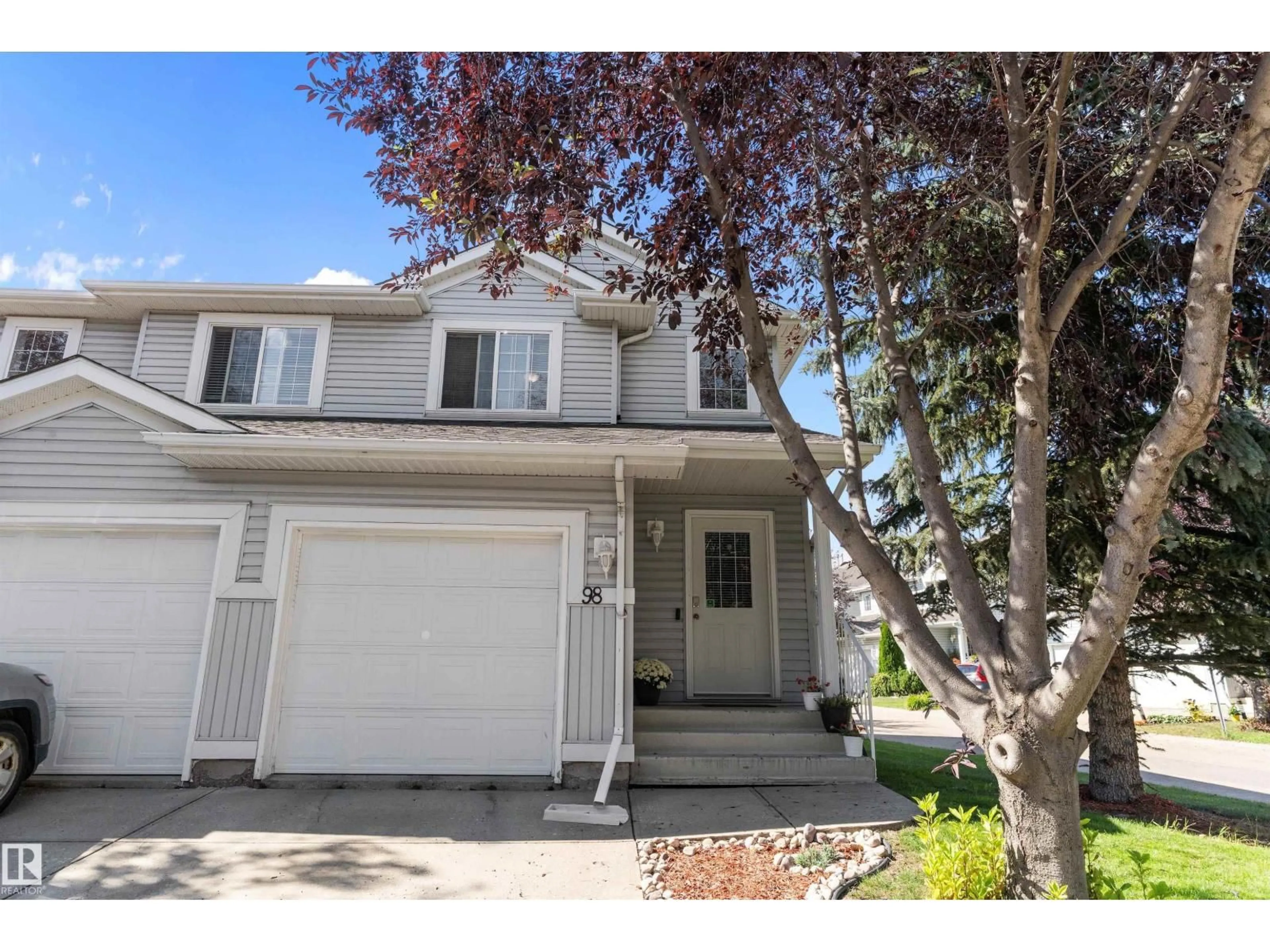 Home with vinyl exterior material, street for 14603 - 98 MILLER BV, Edmonton Alberta T5Y3B6