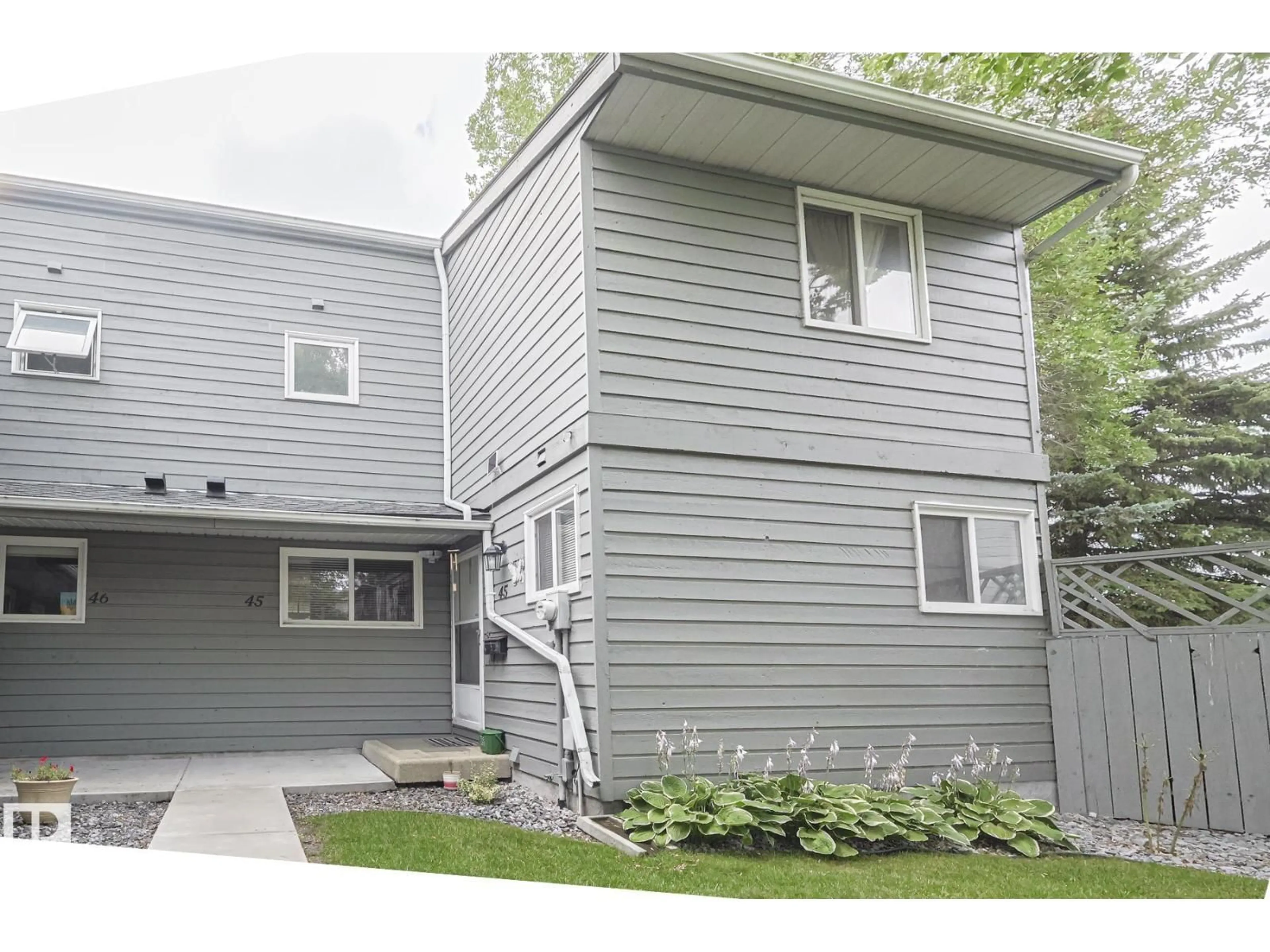 Home with vinyl exterior material, street for #45 - 4610 17 AV, Edmonton Alberta T6L5T1