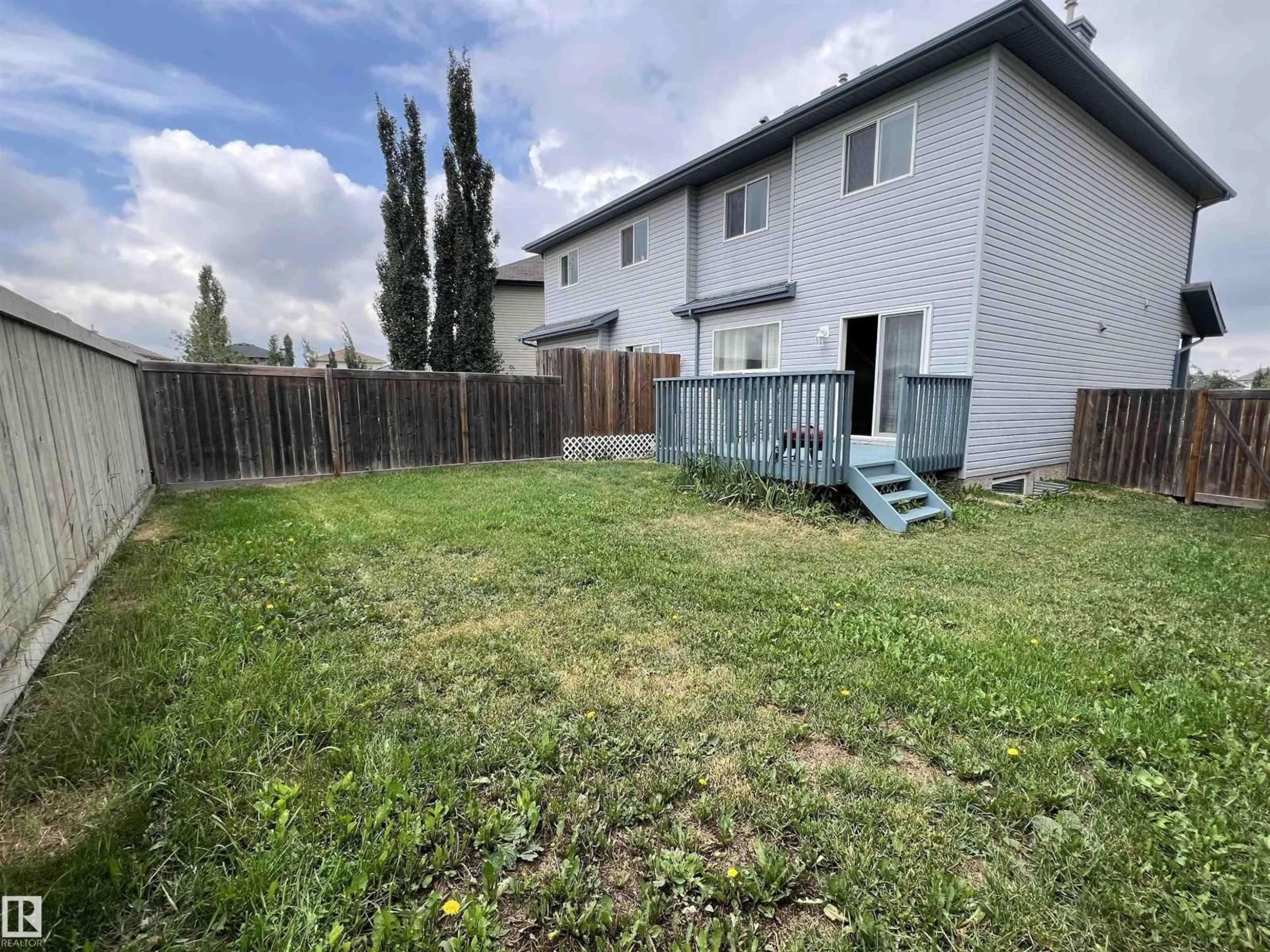 A pic from outside/outdoor area/front of a property/back of a property/a pic from drone, mountain view for 9417 80 AV, Morinville Alberta T8R0B1