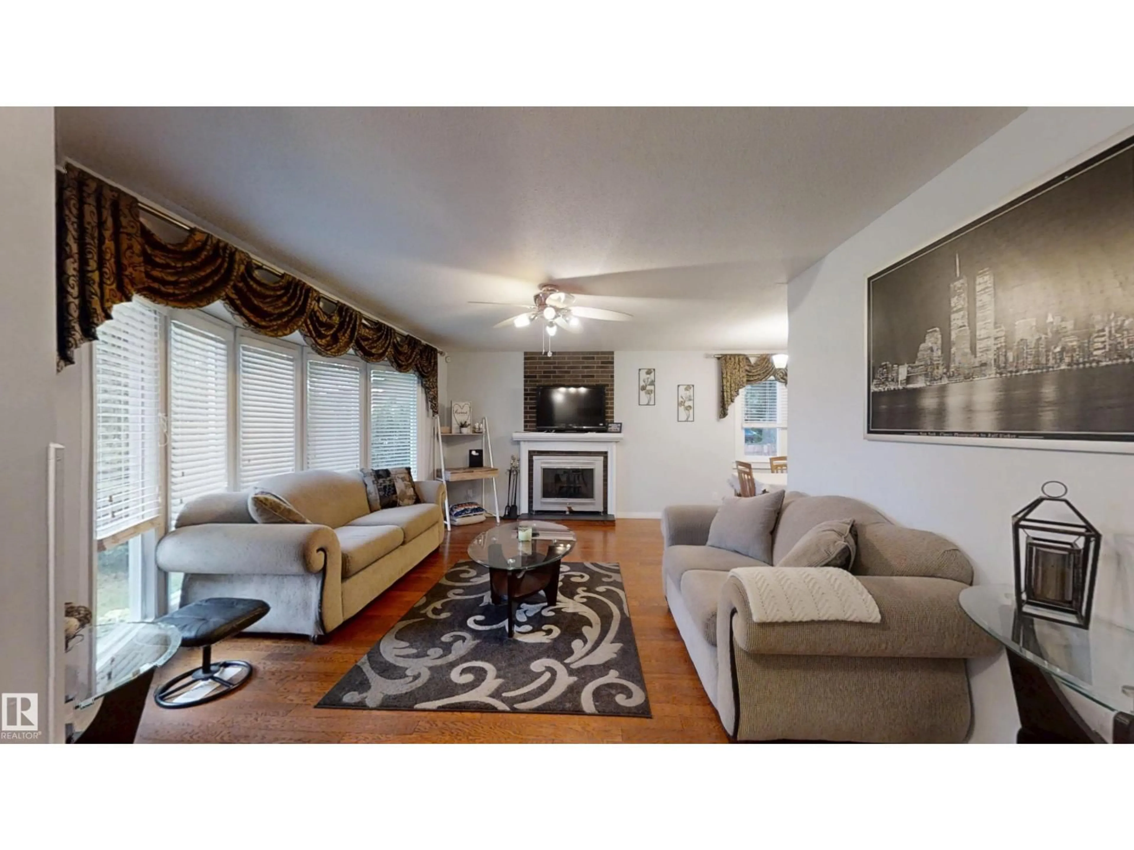 Living room with furniture, unknown for 12203 149 AV, Edmonton Alberta T5X2E1