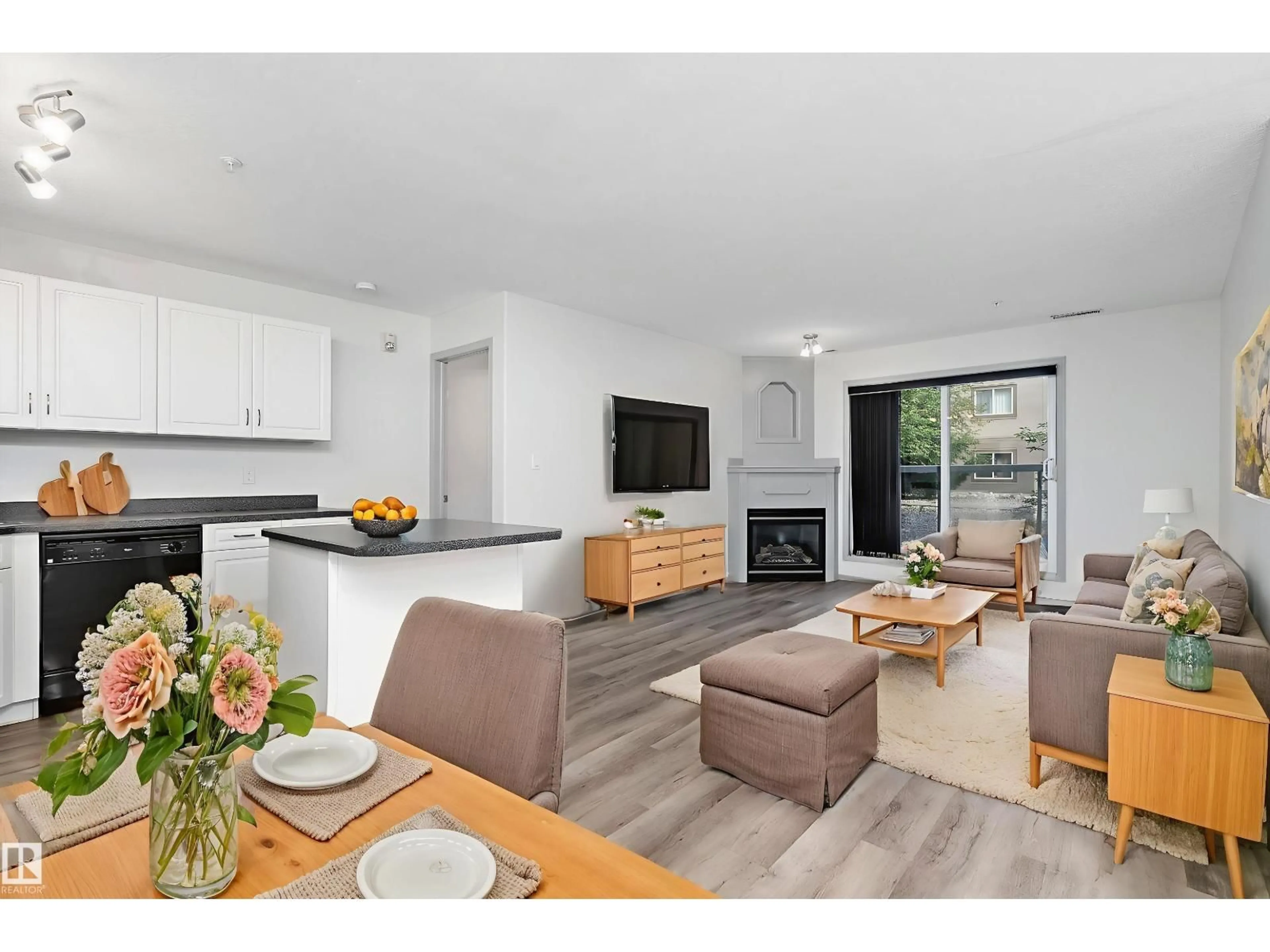 Open concept kitchen, wood/laminate floor for 126 279 SUDER GREENS DR, Edmonton Alberta T5T6X6