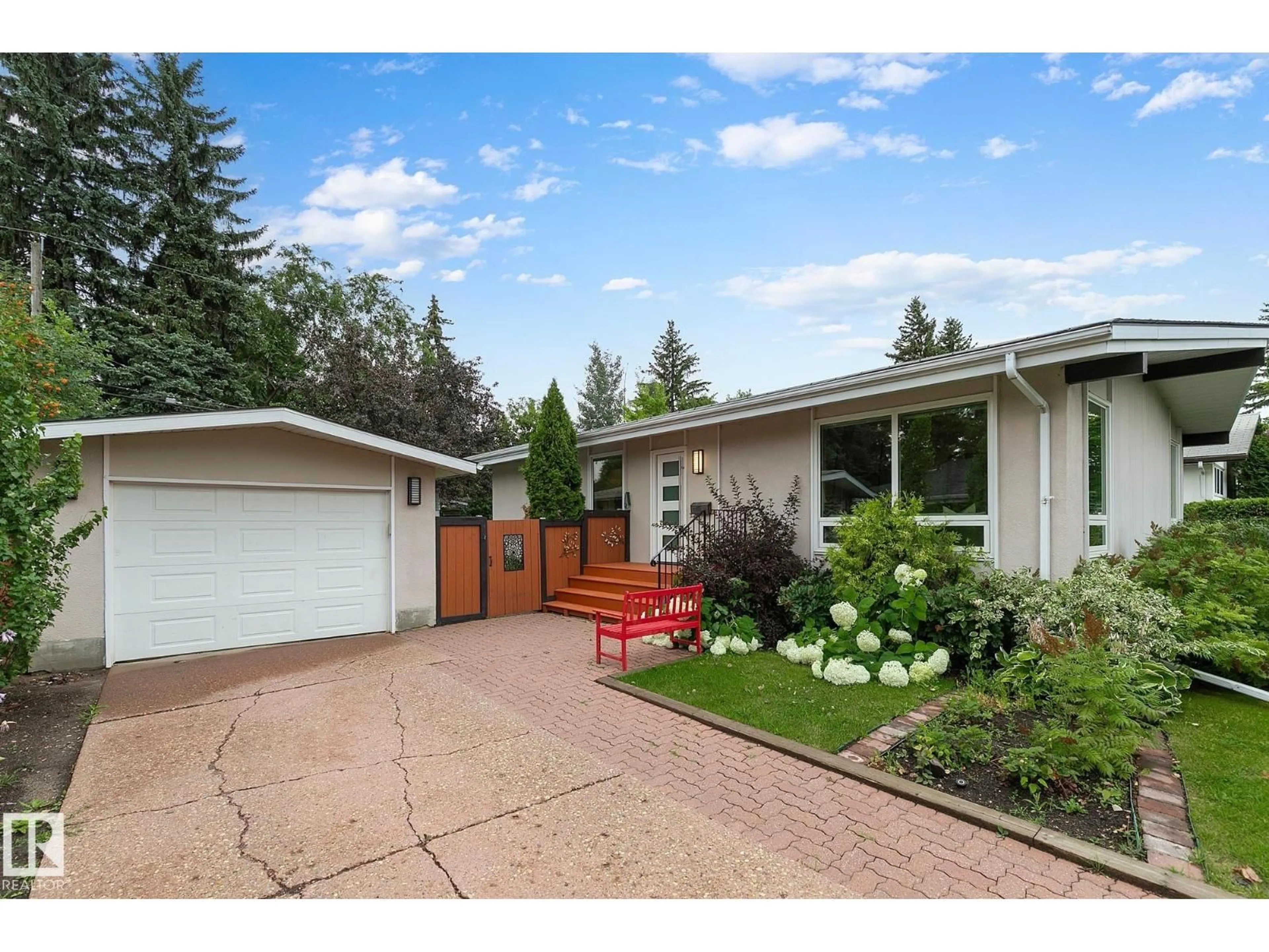 Home with vinyl exterior material, street for 15209 75 AV, Edmonton Alberta T5R2Y9