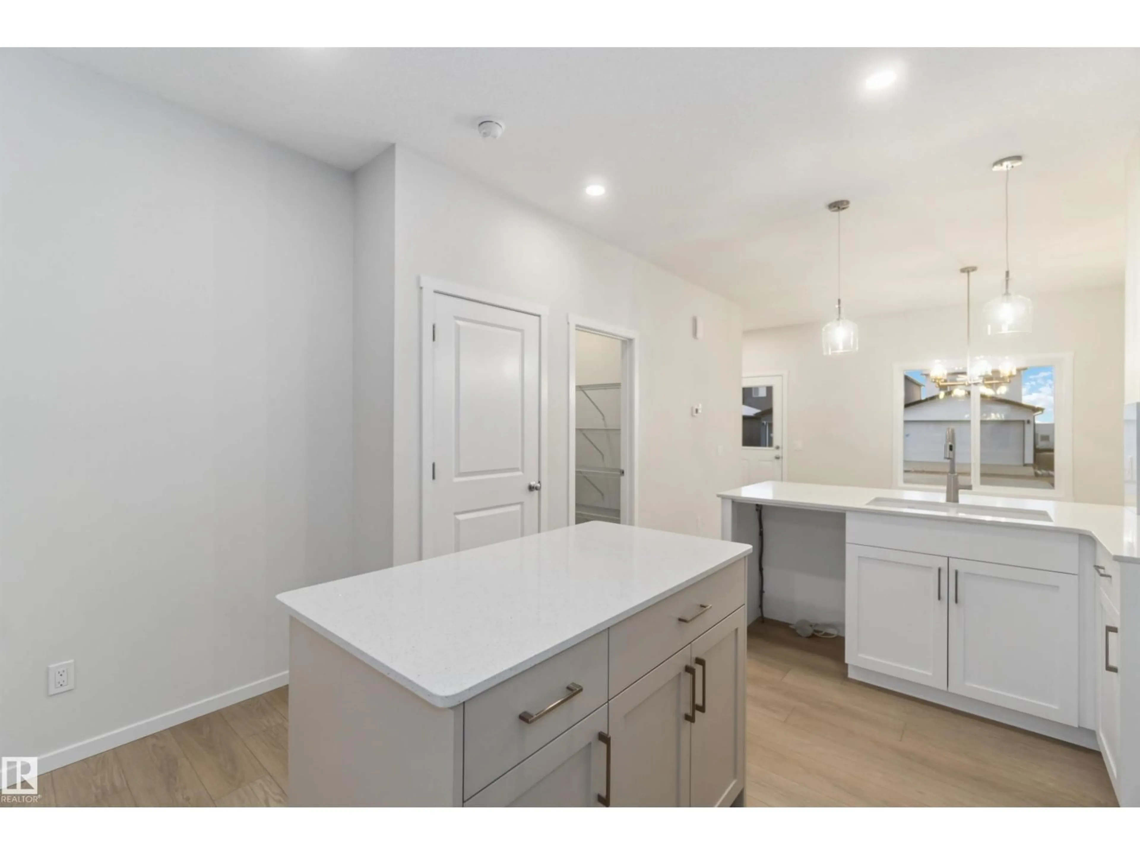 Open concept kitchen, unknown for 9083 ELVES LO, Edmonton Alberta T6M3G4