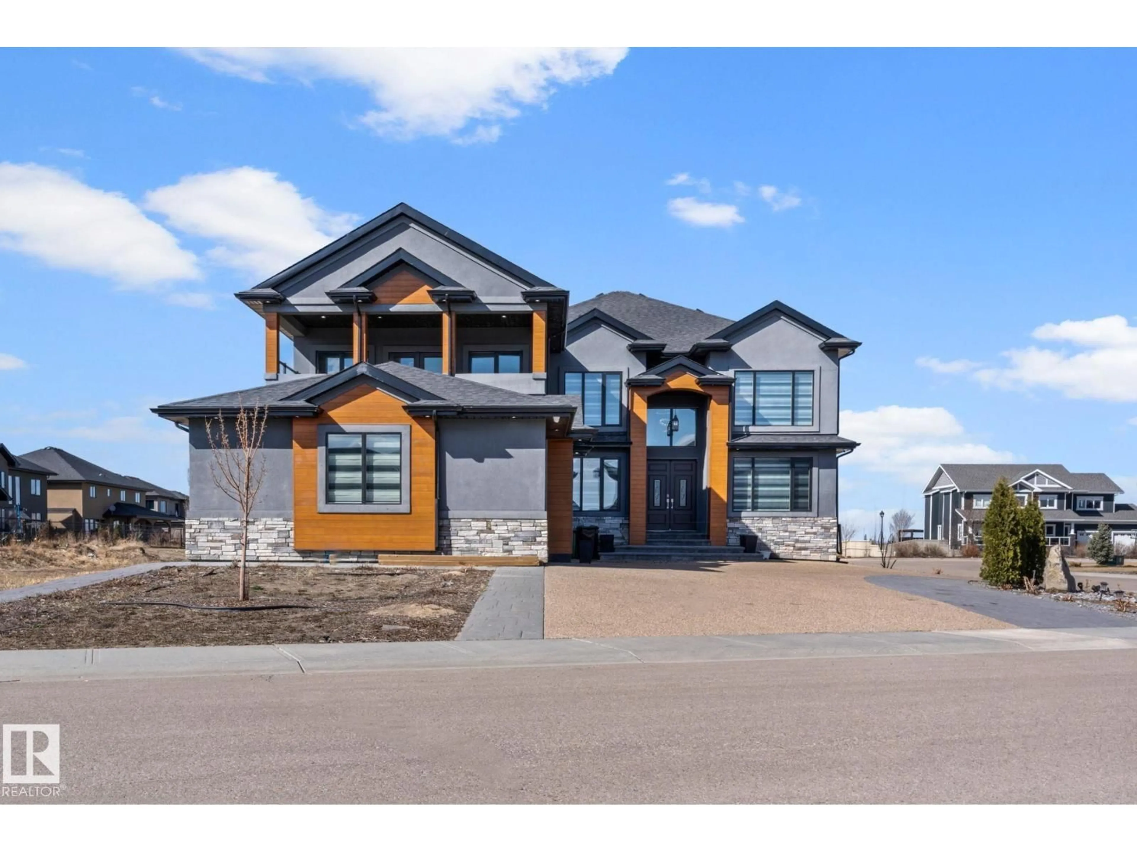 Home with brick exterior material, street for NE - 916 166 AV, Edmonton Alberta T5Y0P6