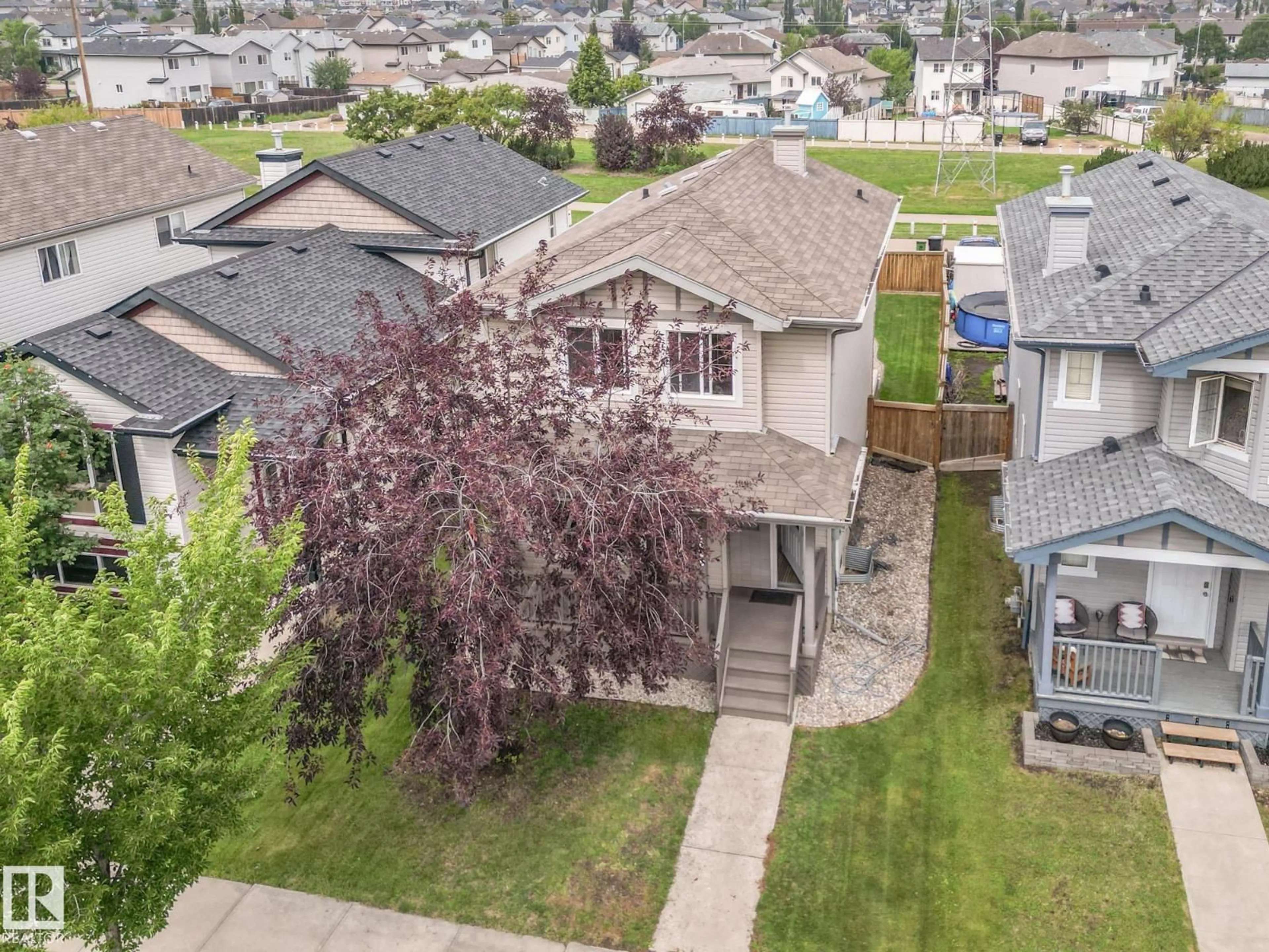 A pic from outside/outdoor area/front of a property/back of a property/a pic from drone, street for 4020 158 AV, Edmonton Alberta T5Y0A3
