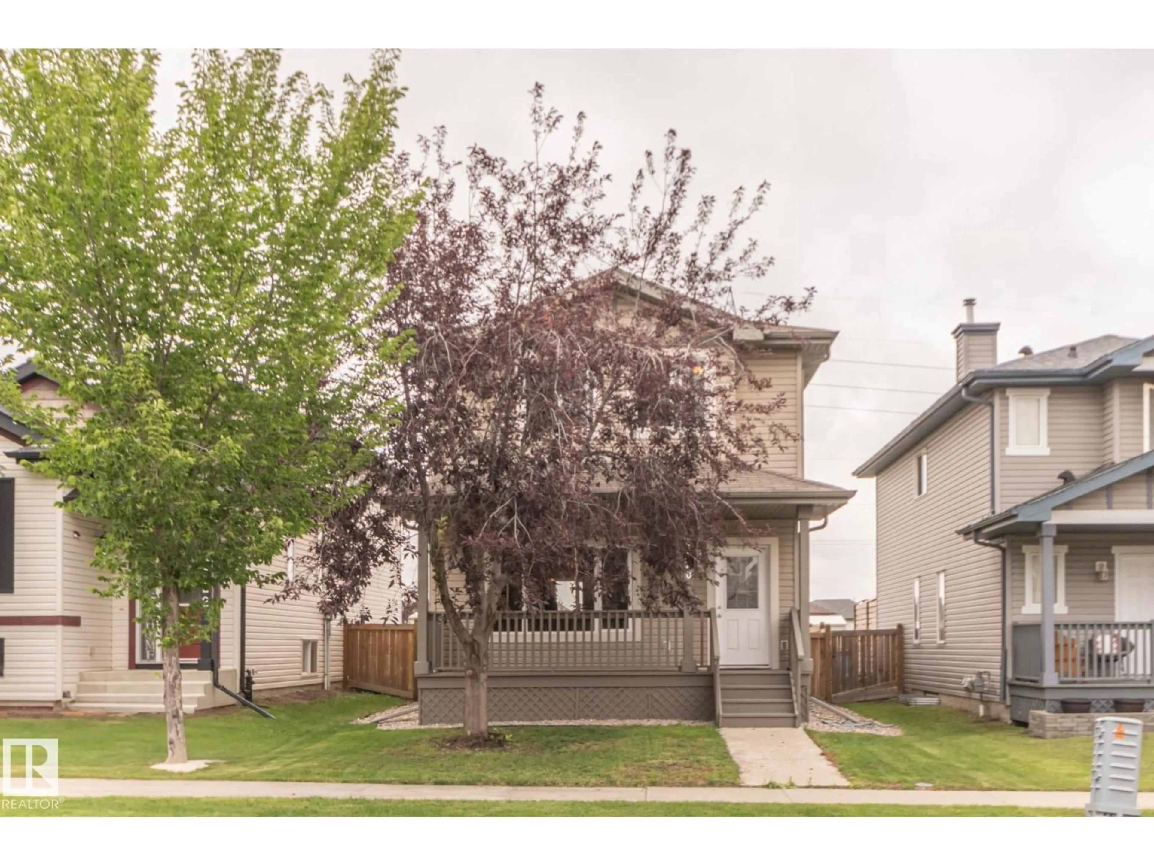 Home with vinyl exterior material, street for 4020 158 AV, Edmonton Alberta T5Y0A3