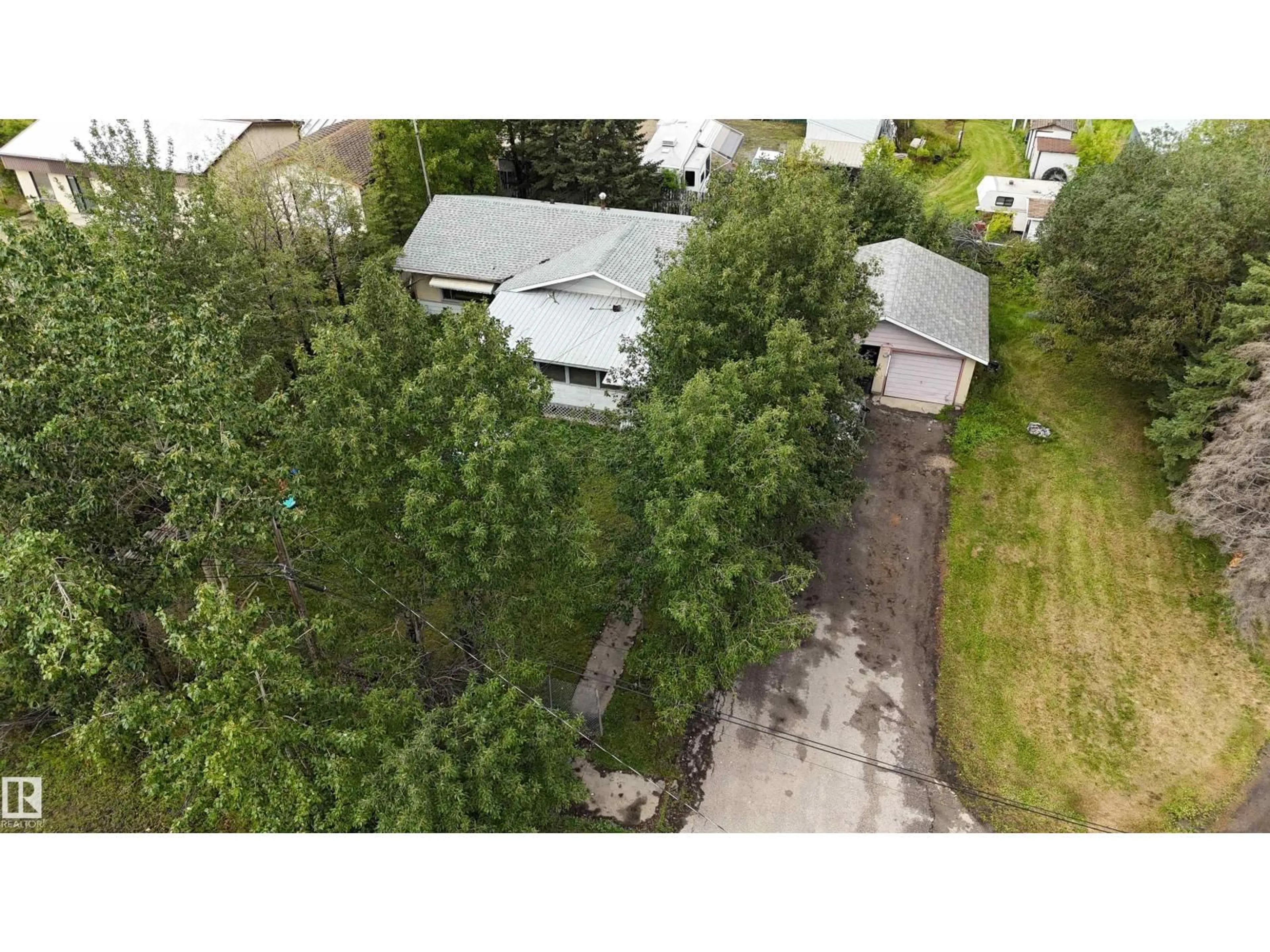 A pic from outside/outdoor area/front of a property/back of a property/a pic from drone, street for 6116 50 AV, Drayton Valley Alberta T7A1J4