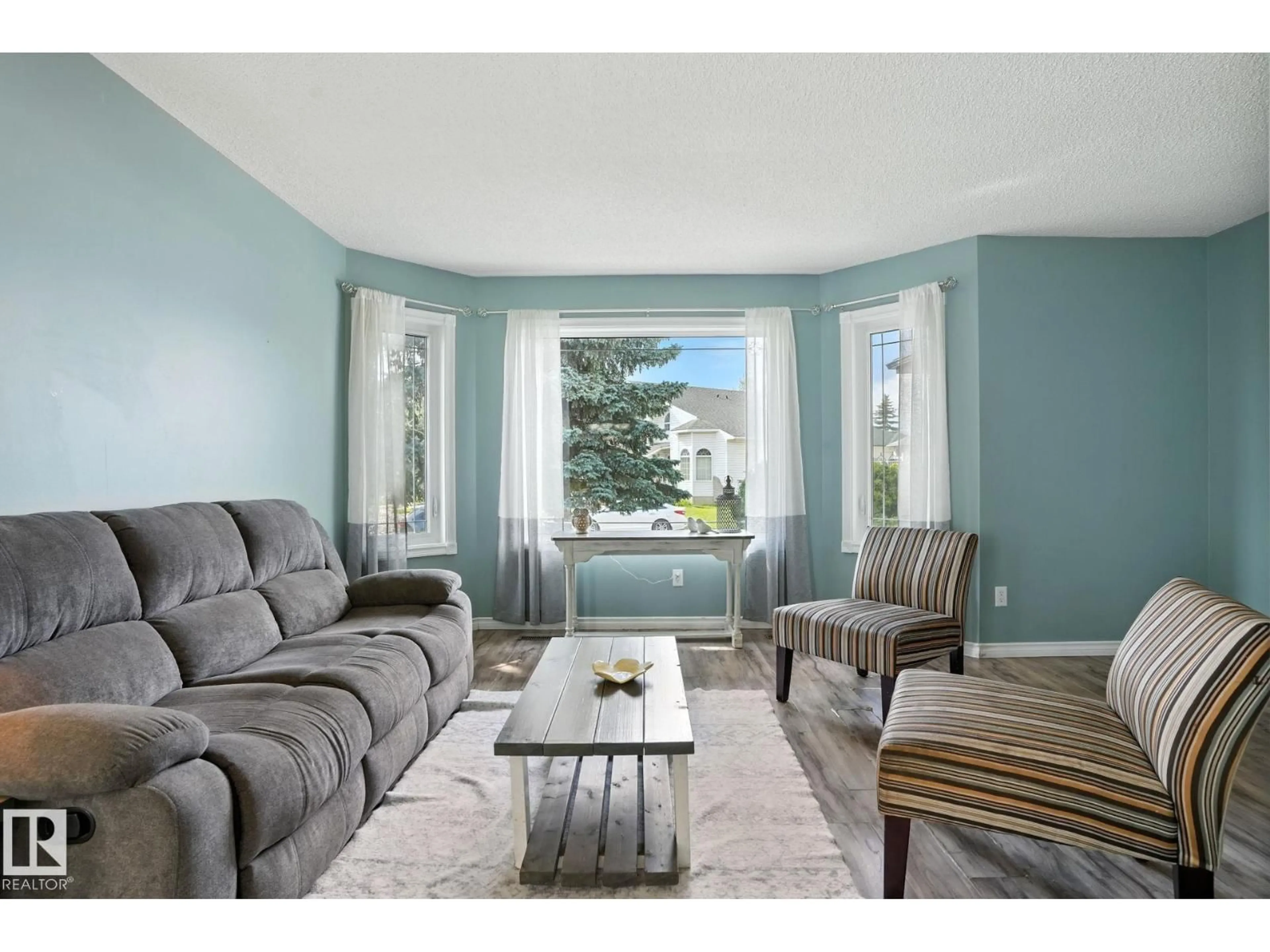 Living room with furniture, unknown for 1031 JAMES CR, Edmonton Alberta T6L6P6