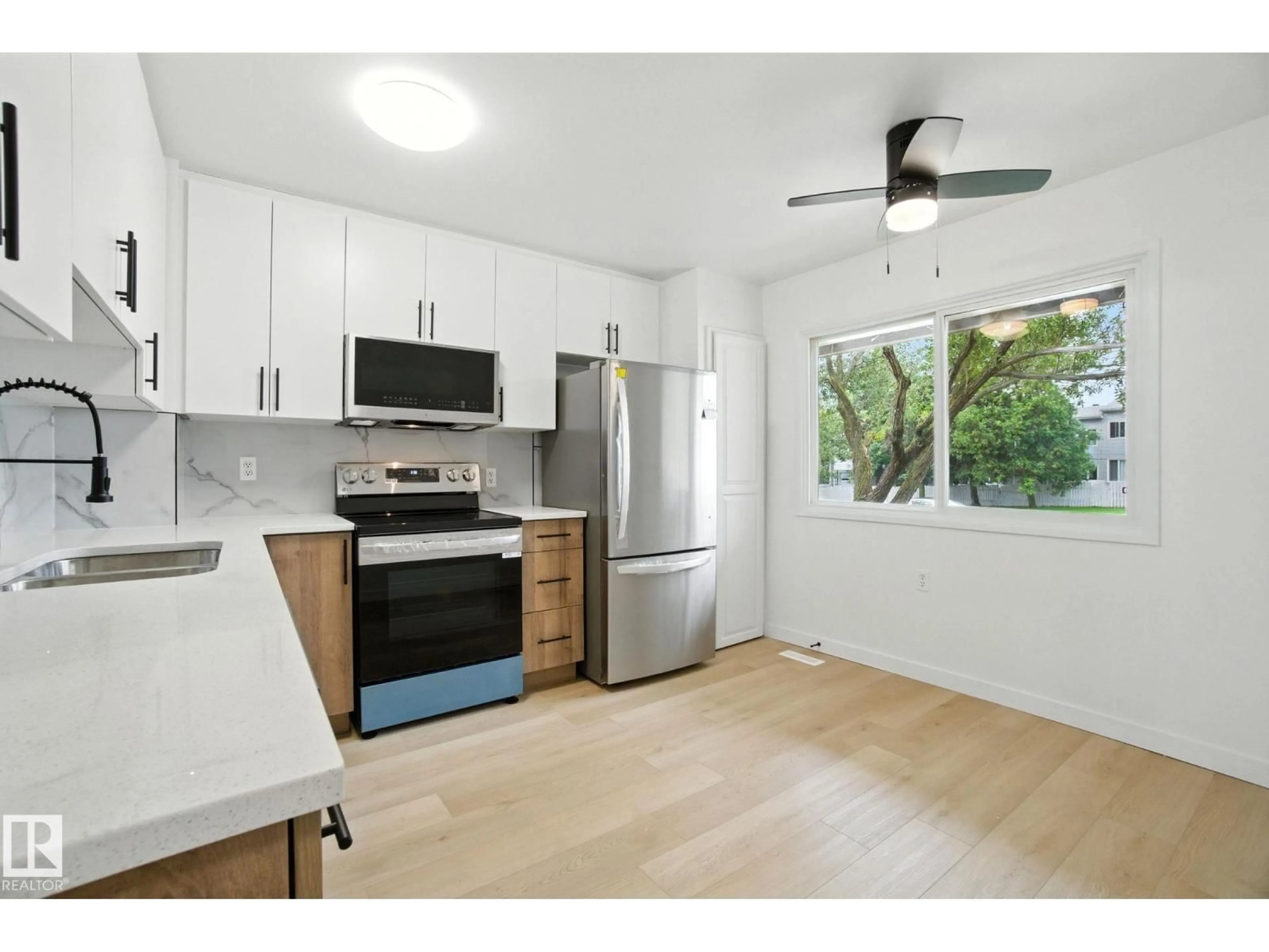 Standard kitchen, wood/laminate floor for 5412 146 AV, Edmonton Alberta T5A4L6