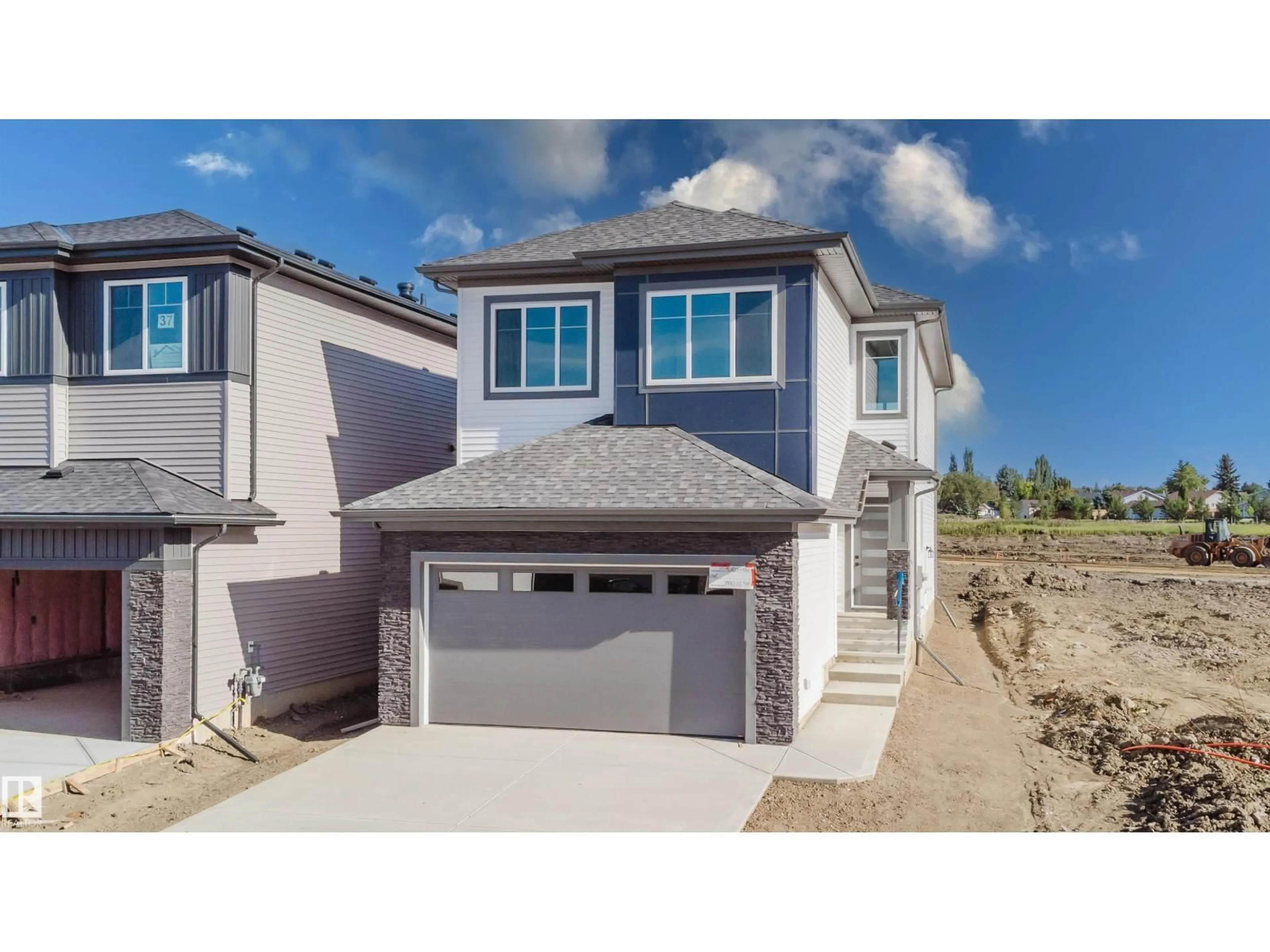 Home with vinyl exterior material, street for 35 MEADOWGROVE LN, Spruce Grove Alberta T7X0W2