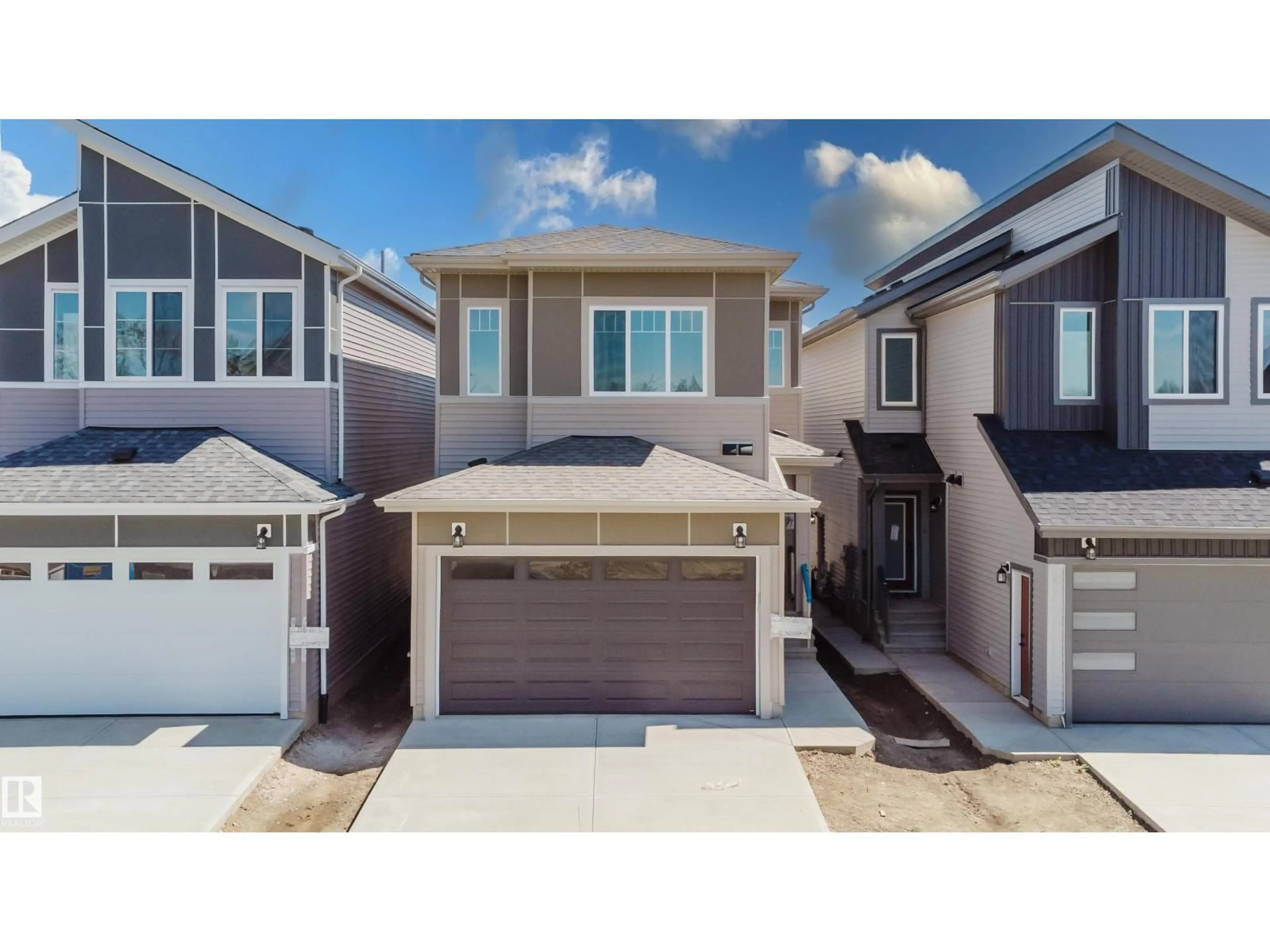 Home with vinyl exterior material, street for NW - 2547 211 ST, Edmonton Alberta T6M3H2