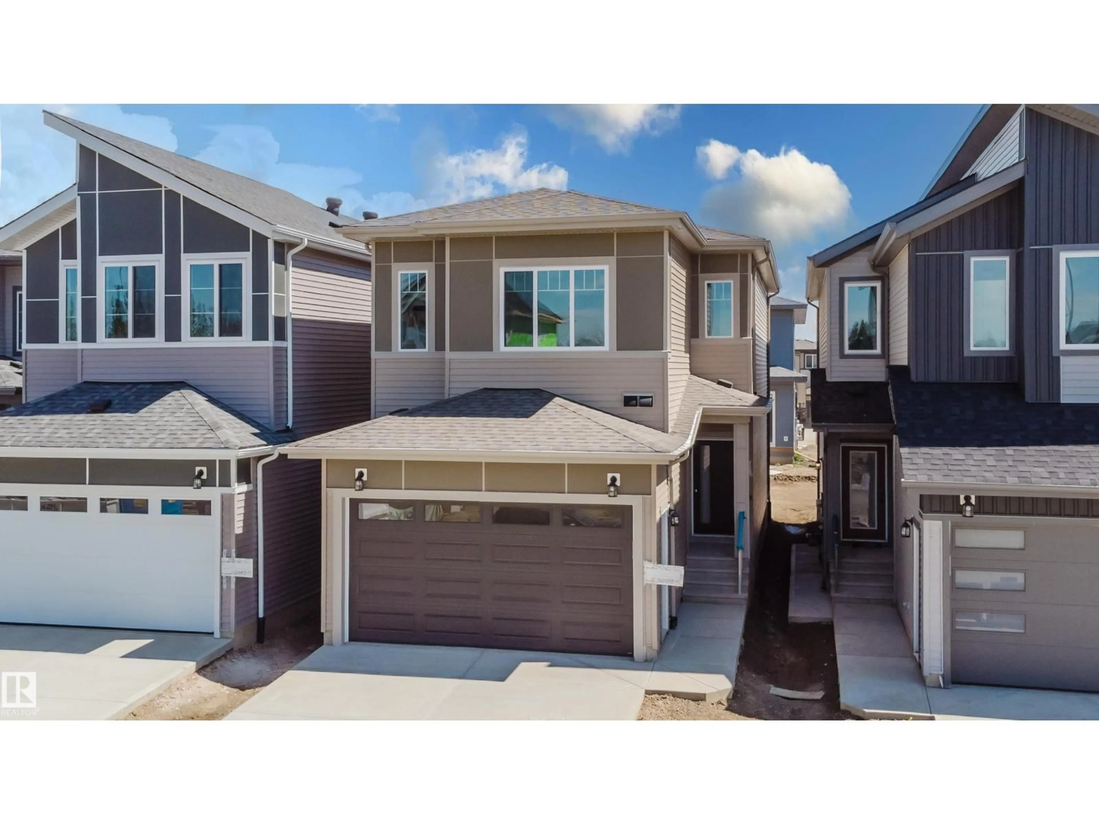 Home with vinyl exterior material, street for NW - 2547 211 ST, Edmonton Alberta T6M3H2