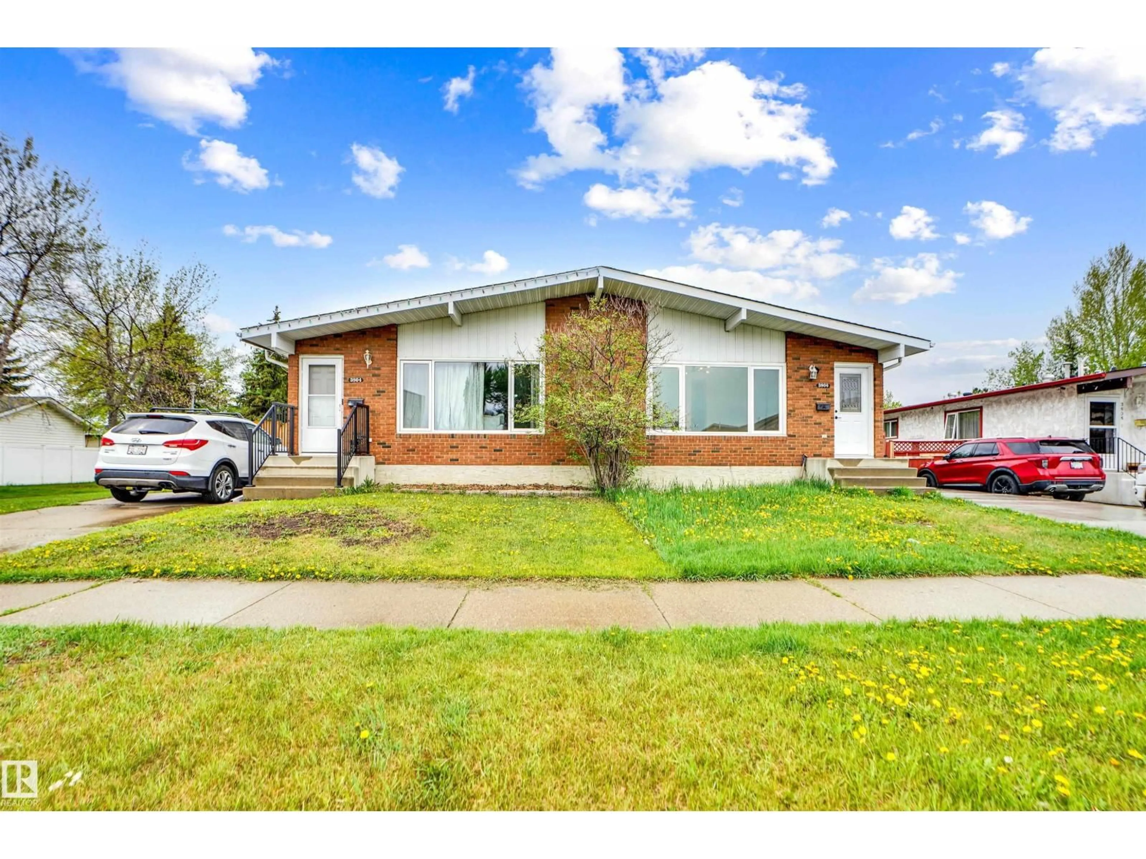 Home with brick exterior material, street for NW - 3806 85 ST, Edmonton Alberta T6K0H6