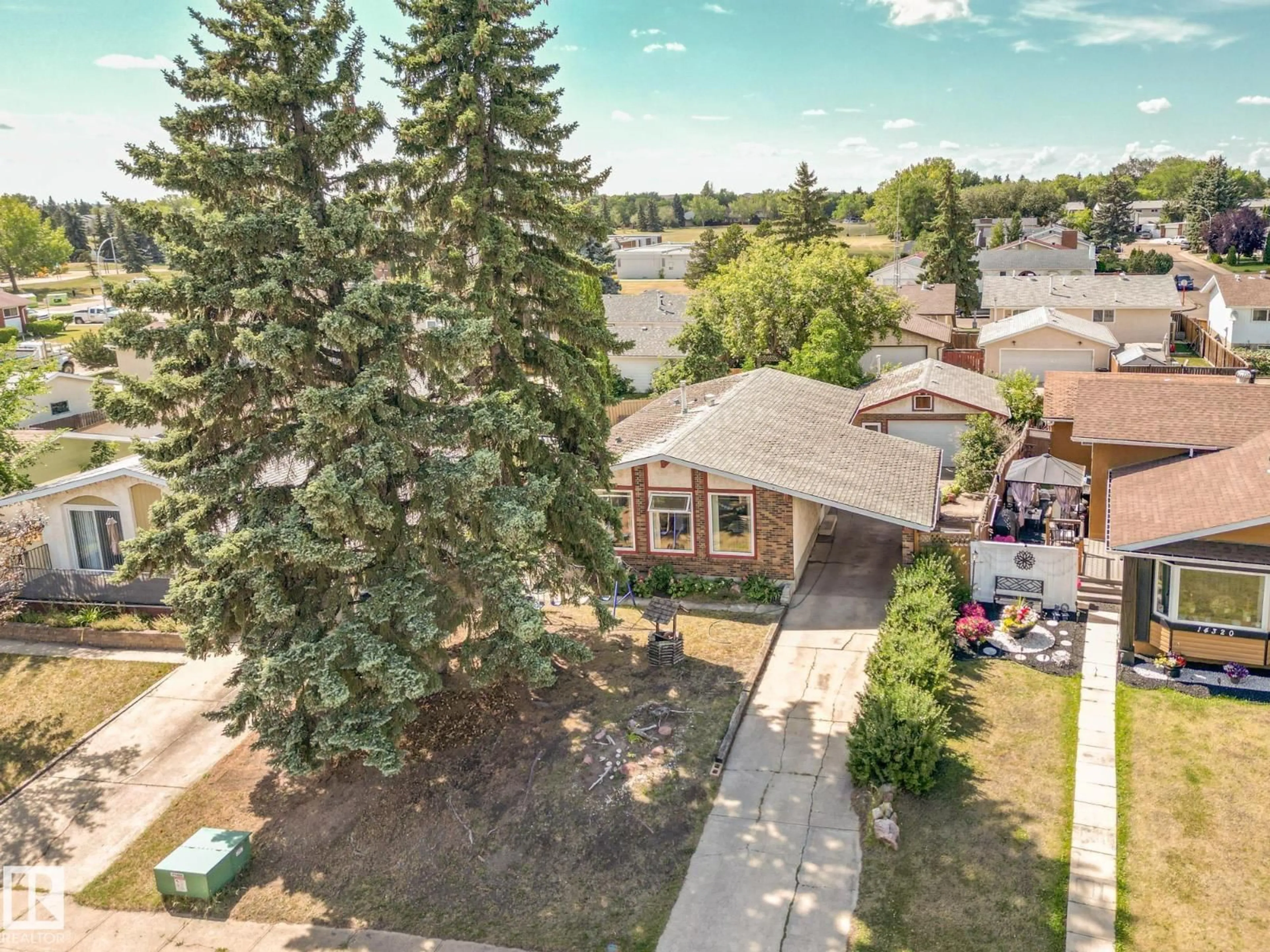 A pic from outside/outdoor area/front of a property/back of a property/a pic from drone, street for NW - 14316 116 ST, Edmonton Alberta T5X1N4