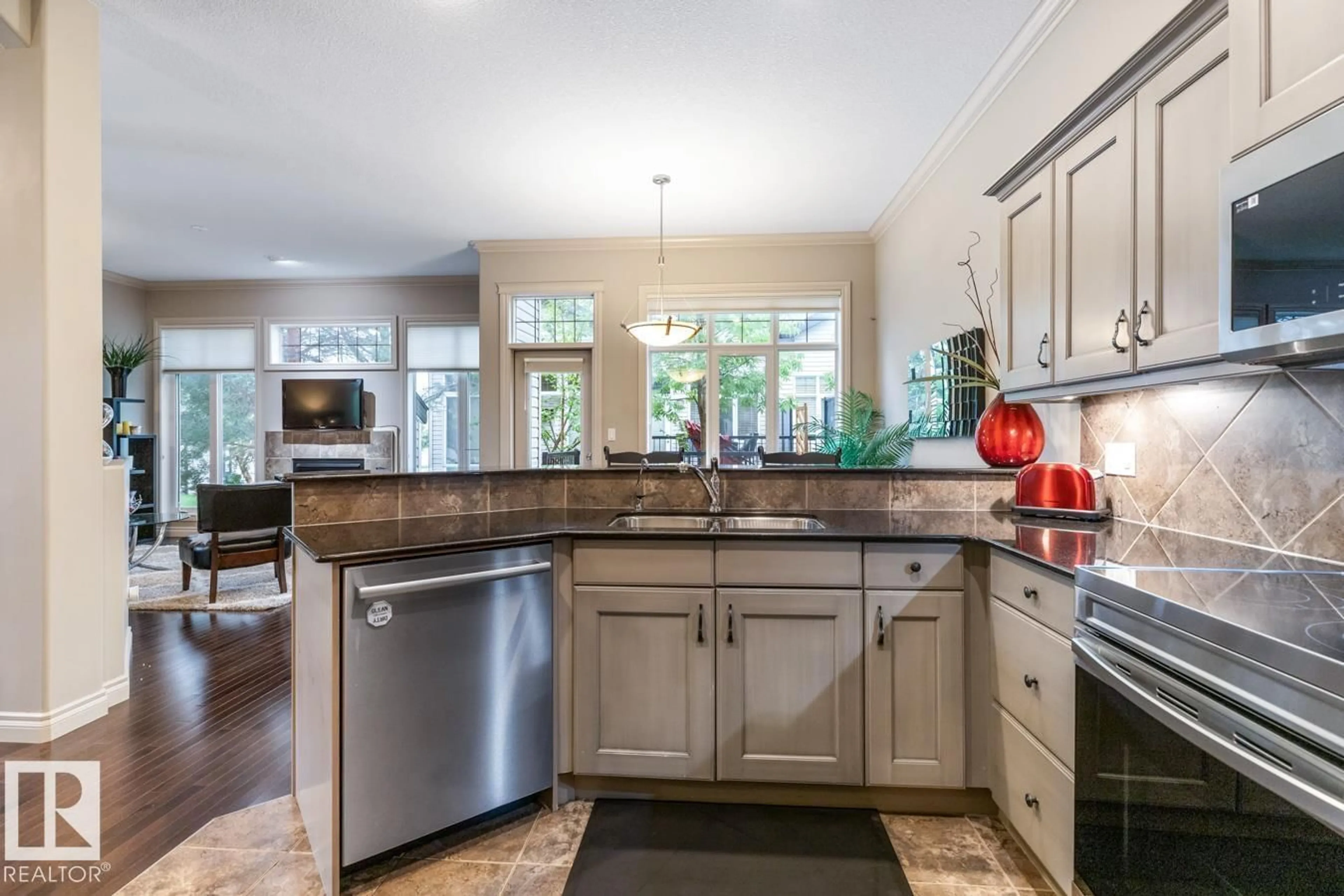 Open concept kitchen, ceramic/tile floor for #21 - 12610 15 AV SW, Edmonton Alberta T6W1X1