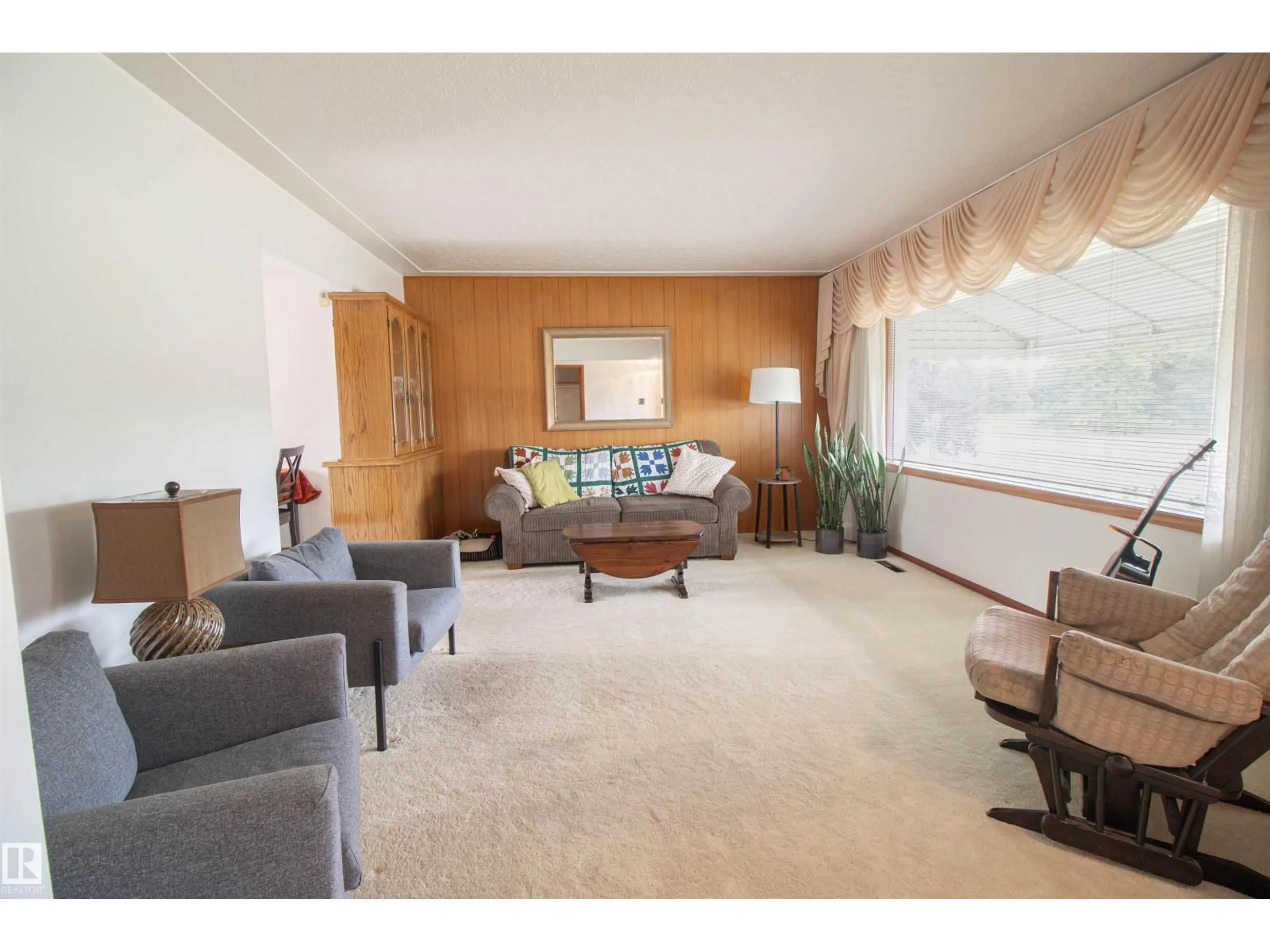Living room with furniture, unknown for 8924 135 AV, Edmonton Alberta T5E1N4