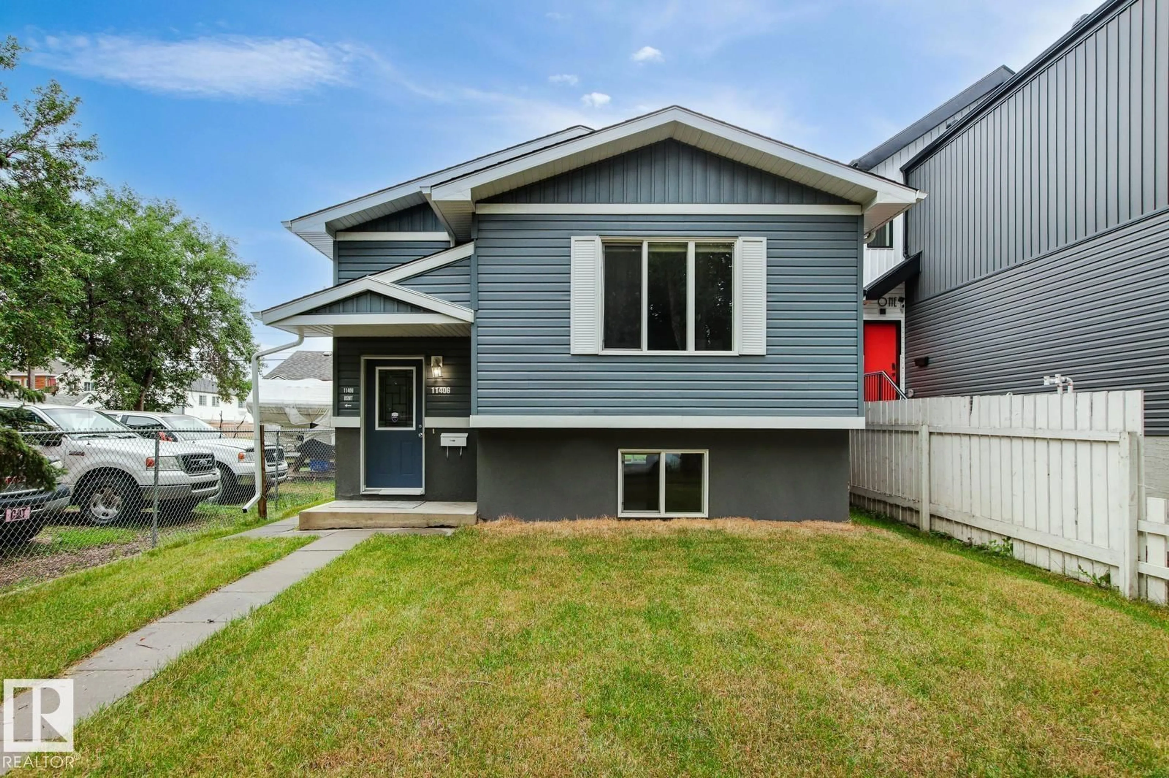 Home with vinyl exterior material, street for NW - 11406 85 ST, Edmonton Alberta T5B3C9
