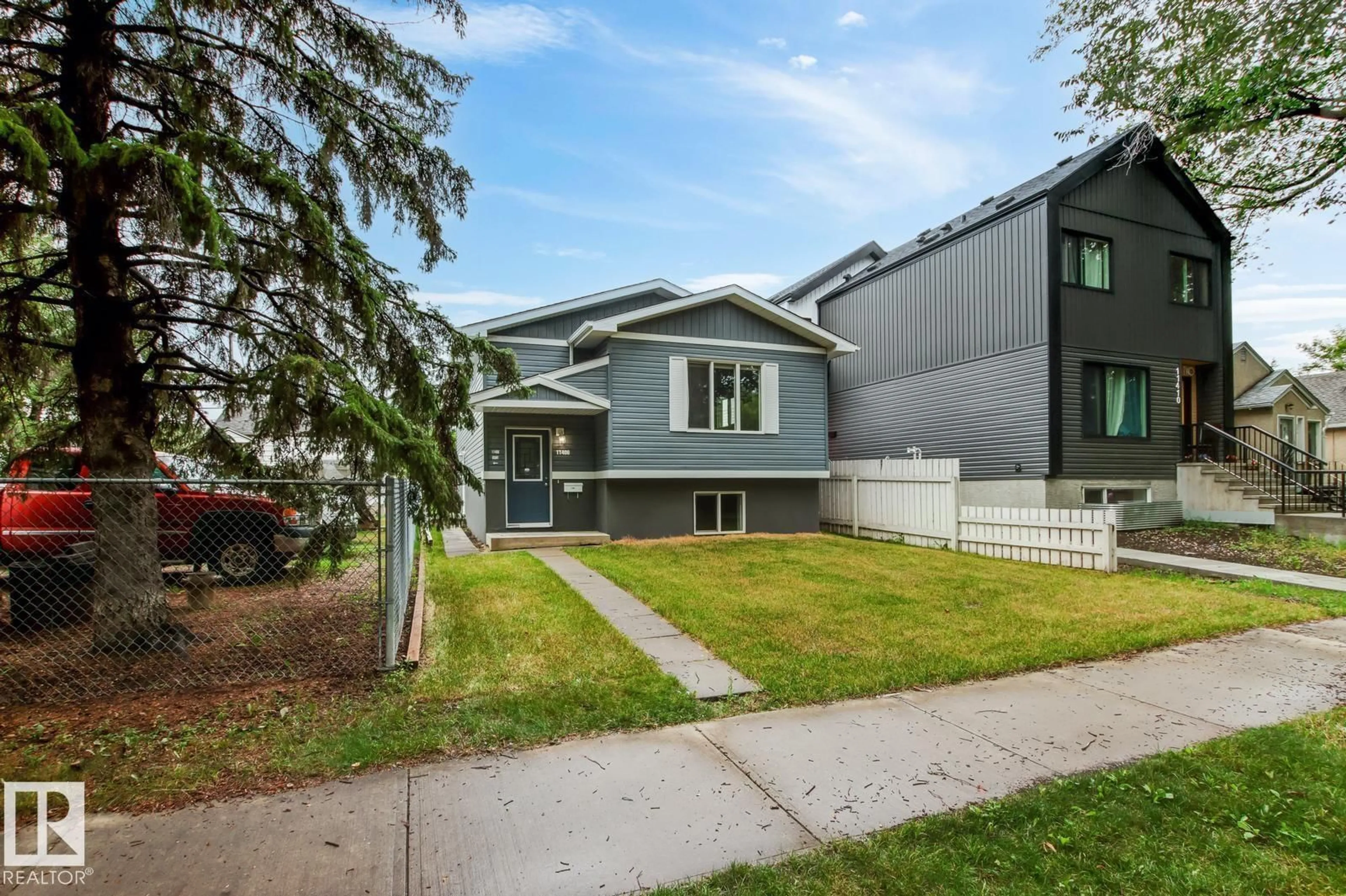 Home with vinyl exterior material, street for NW - 11406 85 ST, Edmonton Alberta T5B3C9