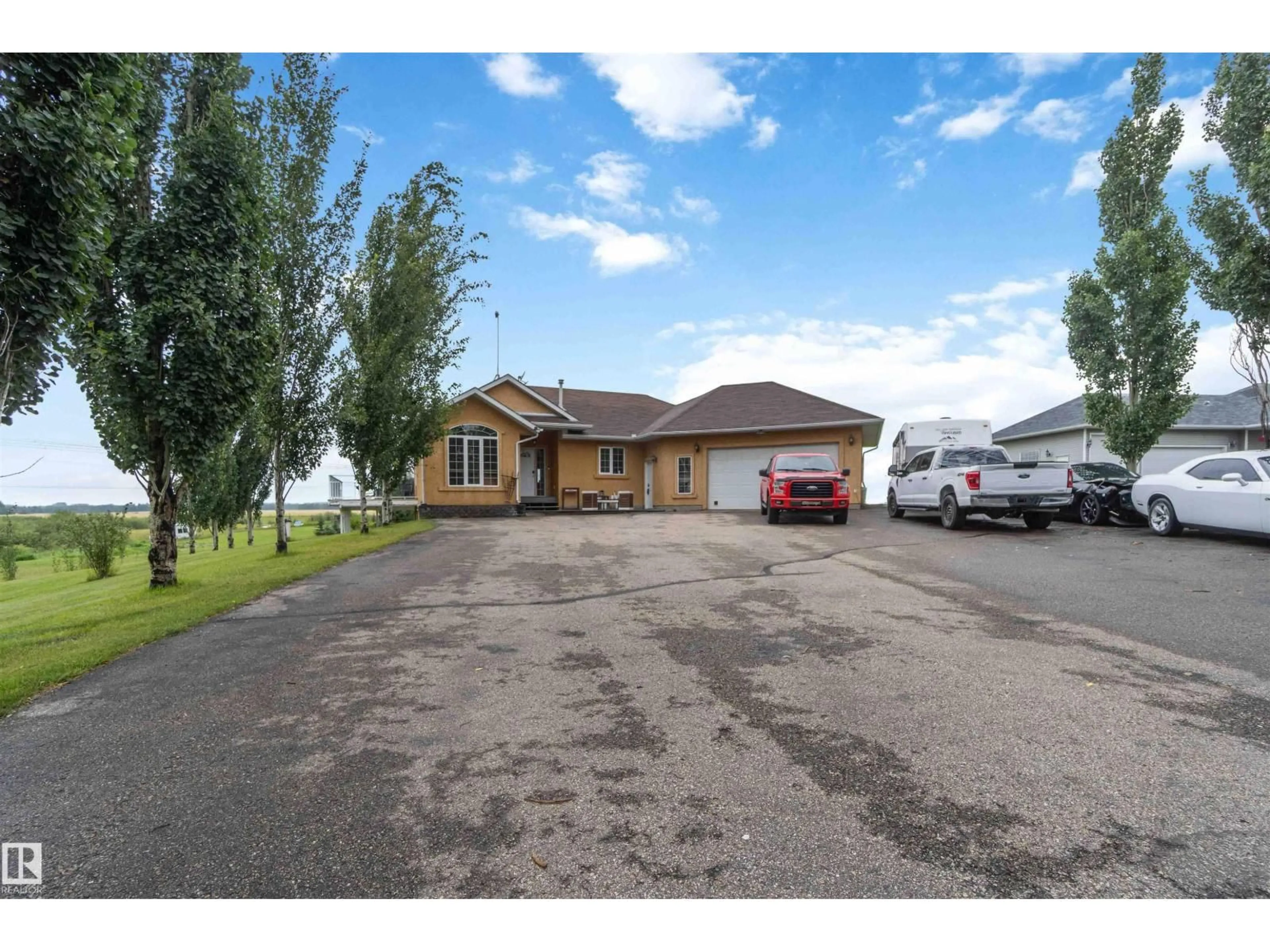 A pic from outside/outdoor area/front of a property/back of a property/a pic from drone, street for 52001 - 38 RGE ROAD 275, Rural Parkland County Alberta T7X3V2