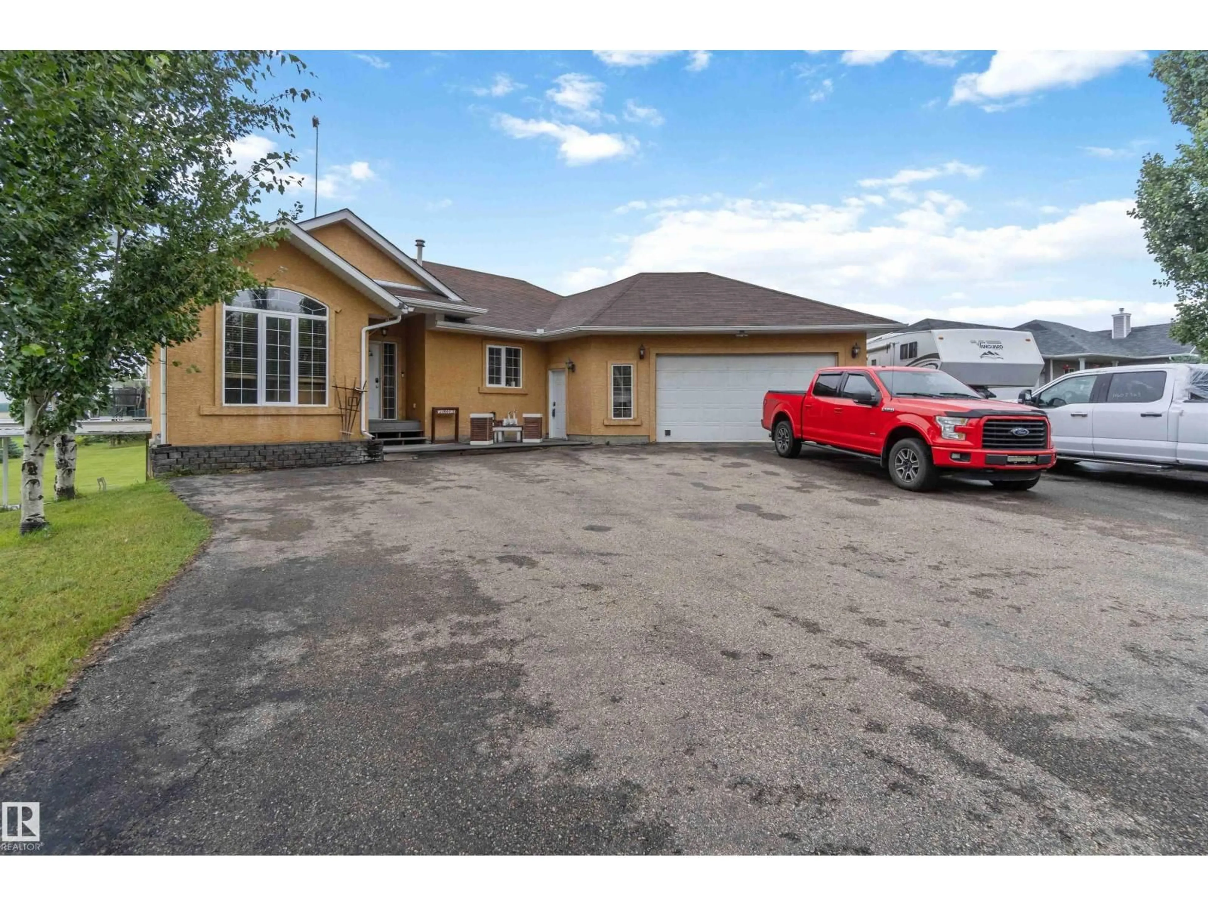 A pic from outside/outdoor area/front of a property/back of a property/a pic from drone, street for 52001 - 38 RGE ROAD 275, Rural Parkland County Alberta T7X3V2
