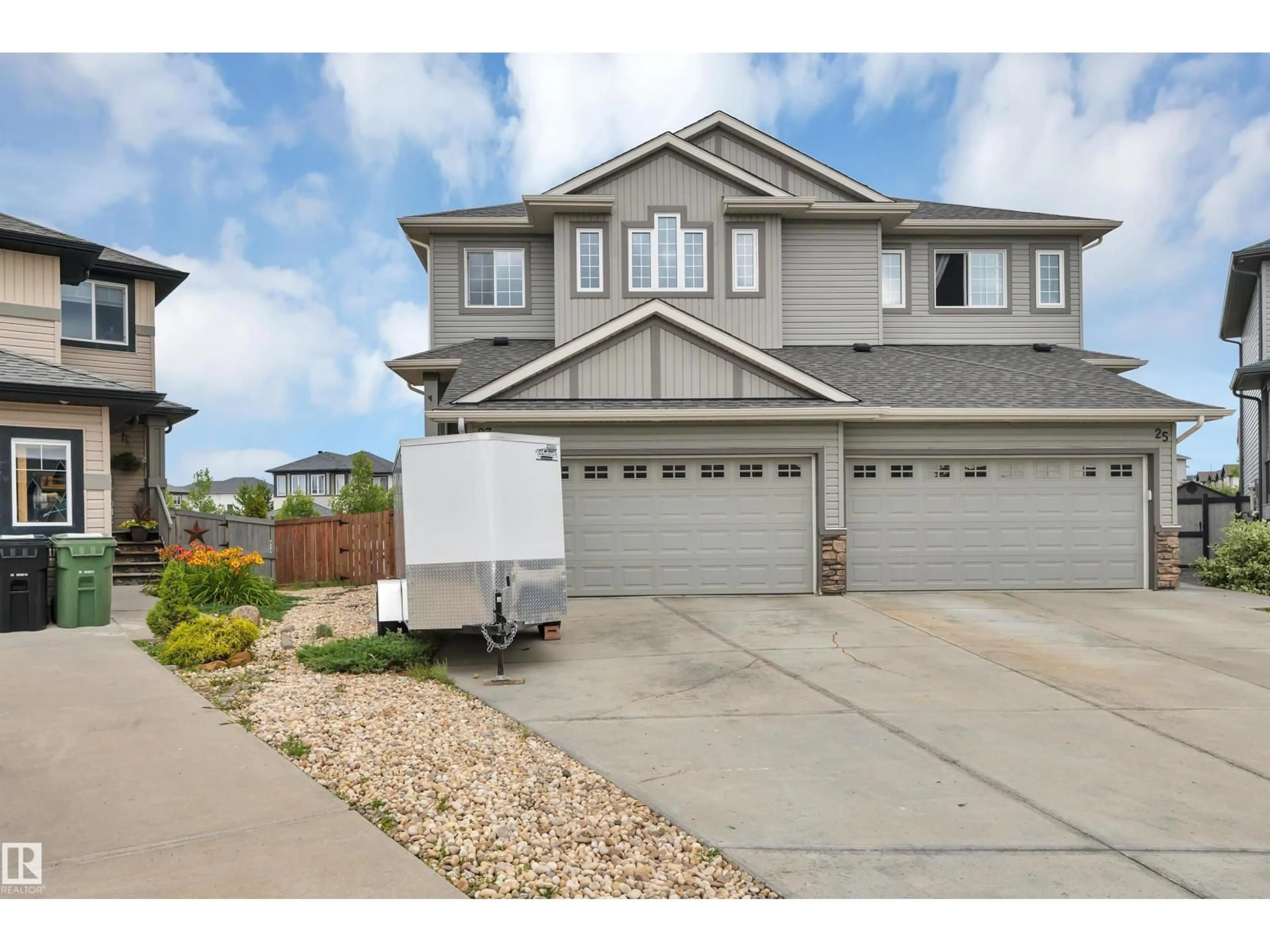 Home with vinyl exterior material, street for 27 MCLEAN, Leduc Alberta T9E8A1