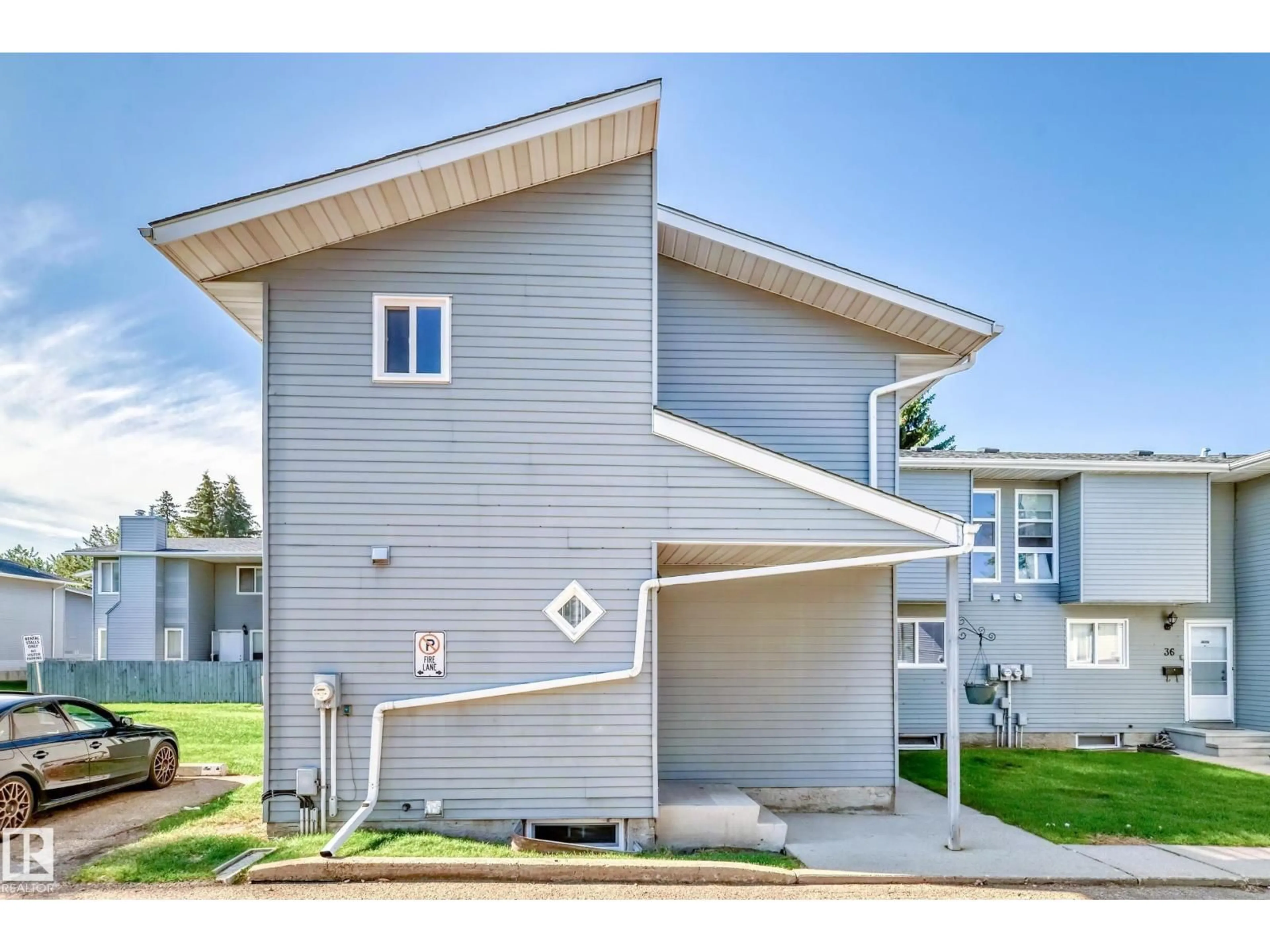 Home with vinyl exterior material, street for 38 - 1415 62 ST NW, Edmonton Alberta T6L4K1
