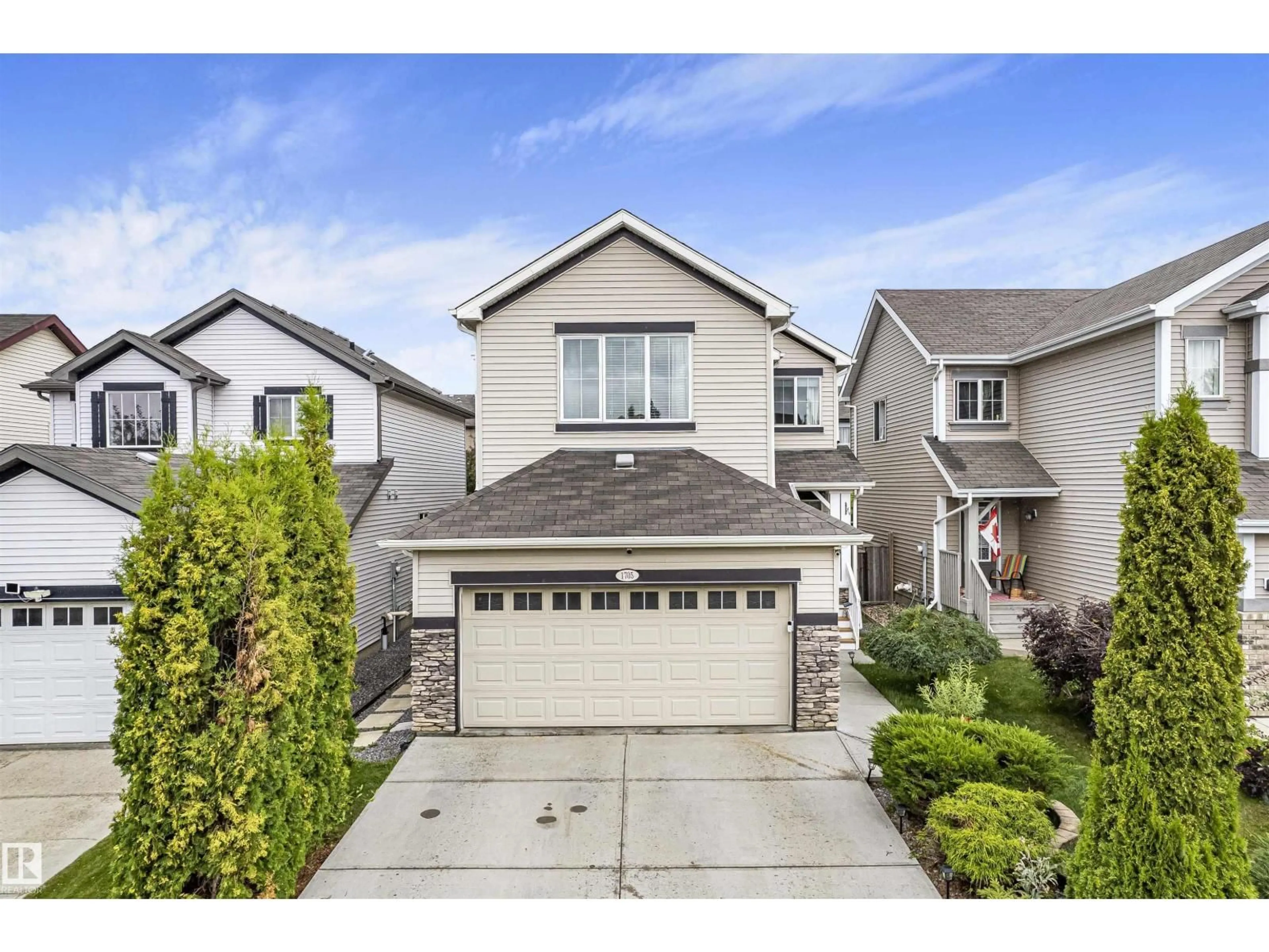 Home with vinyl exterior material, street for 1705 63A STREET, Edmonton Alberta T6X0R8