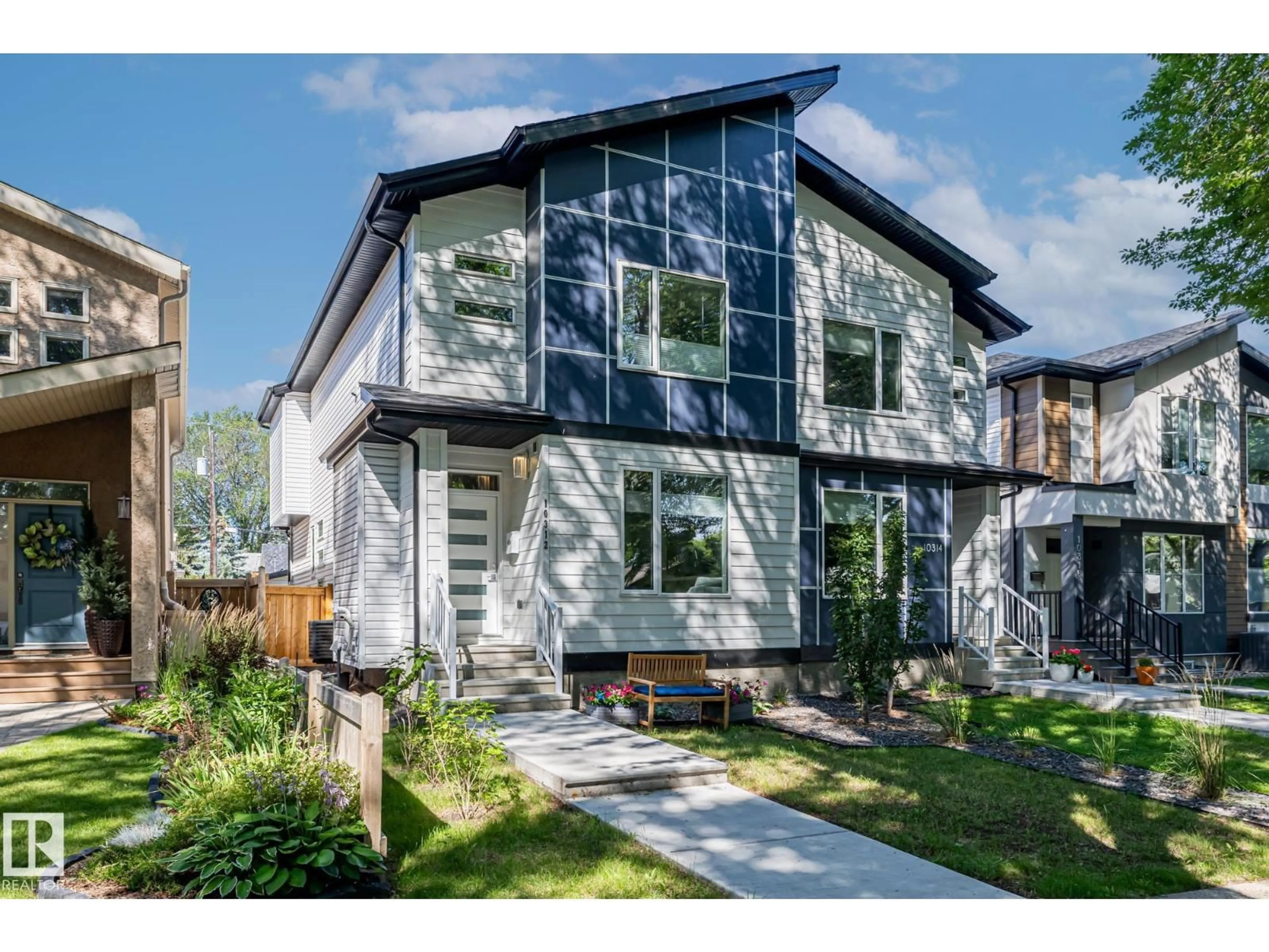 Home with vinyl exterior material, street for NW - 10312 78 ST, Edmonton Alberta T6A3E5