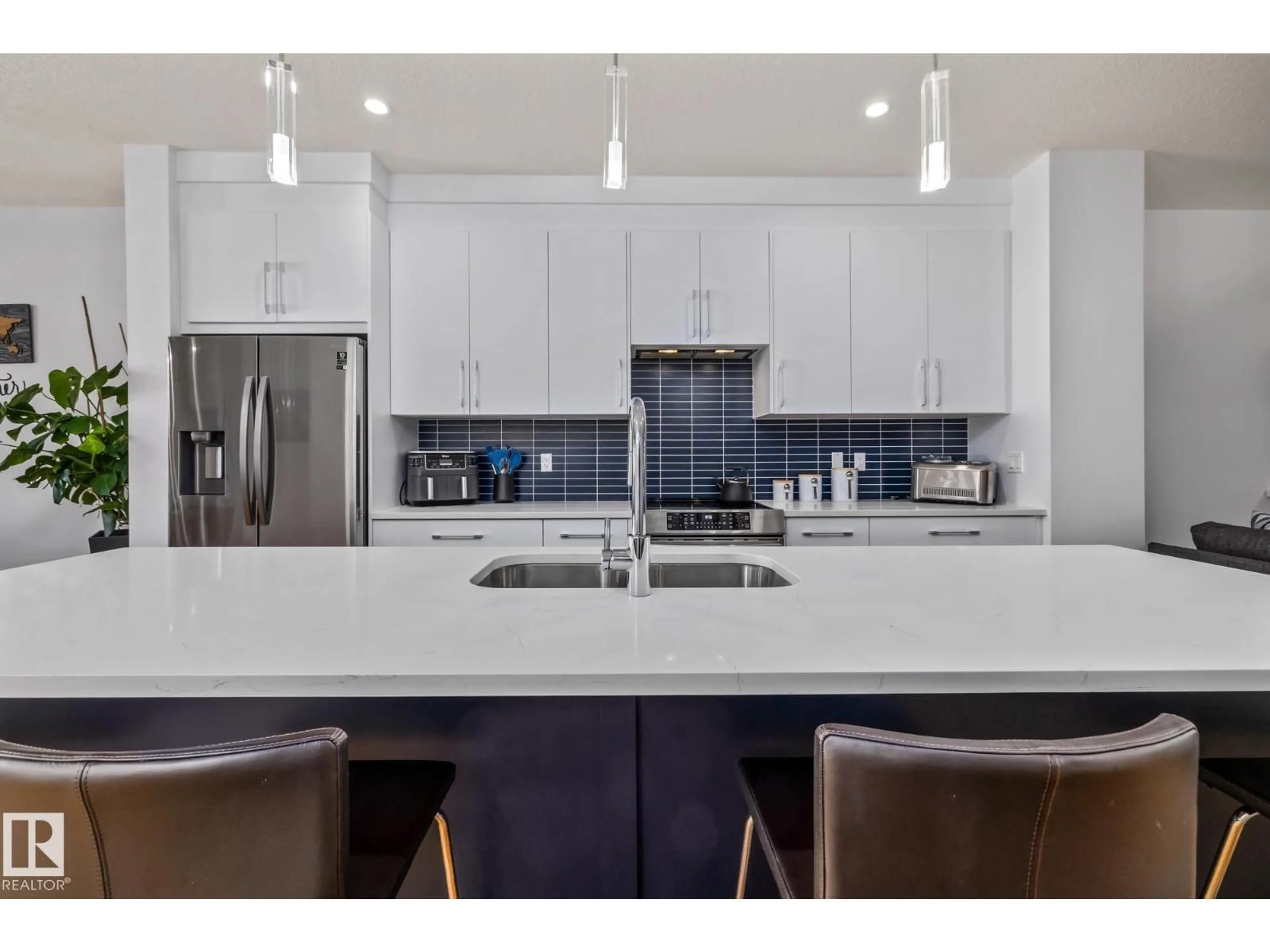 Open concept kitchen, ceramic/tile floor for NW - 10312 78 ST, Edmonton Alberta T6A3E5