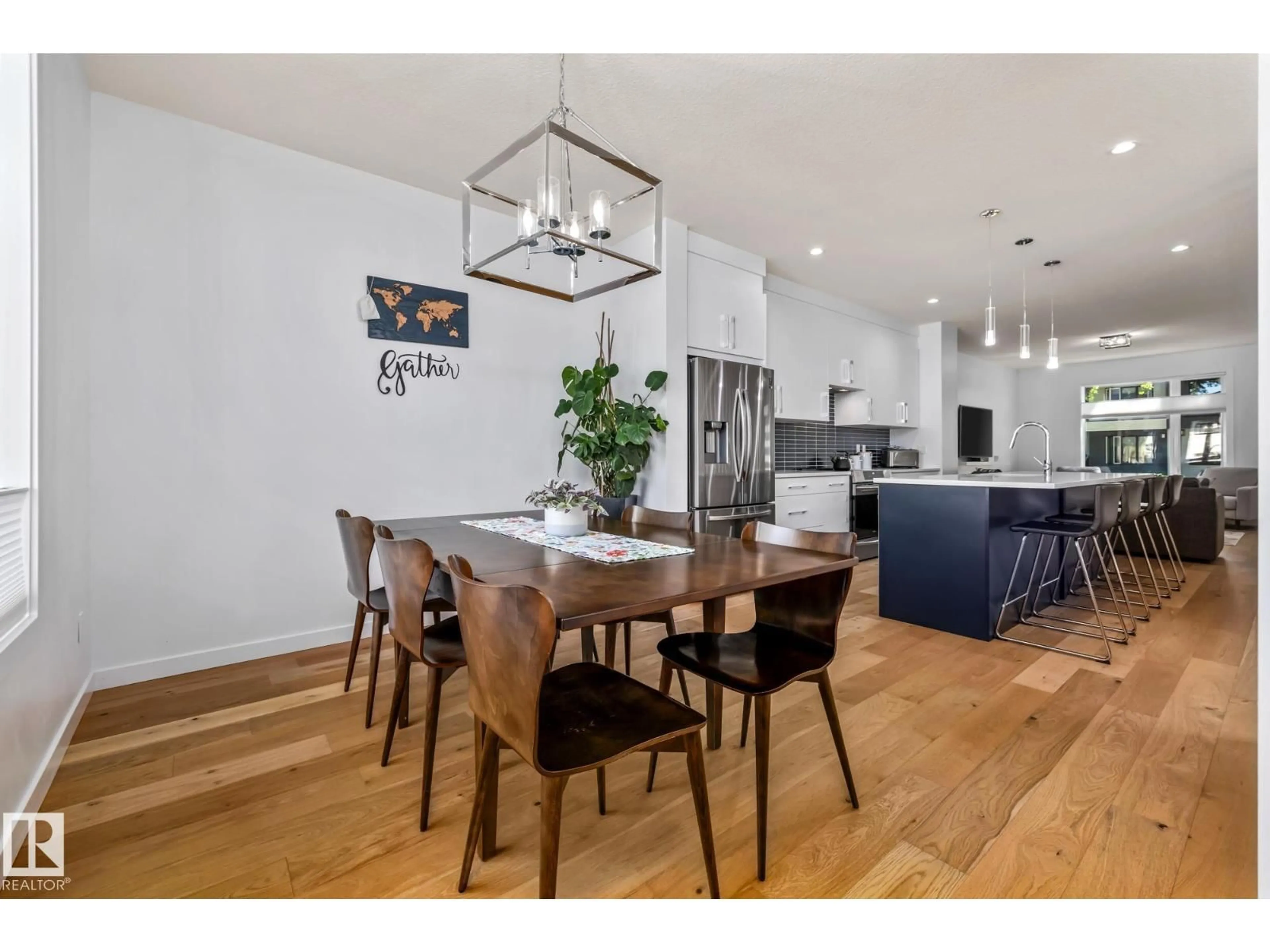 Open concept kitchen, wood/laminate floor for NW - 10312 78 ST, Edmonton Alberta T6A3E5