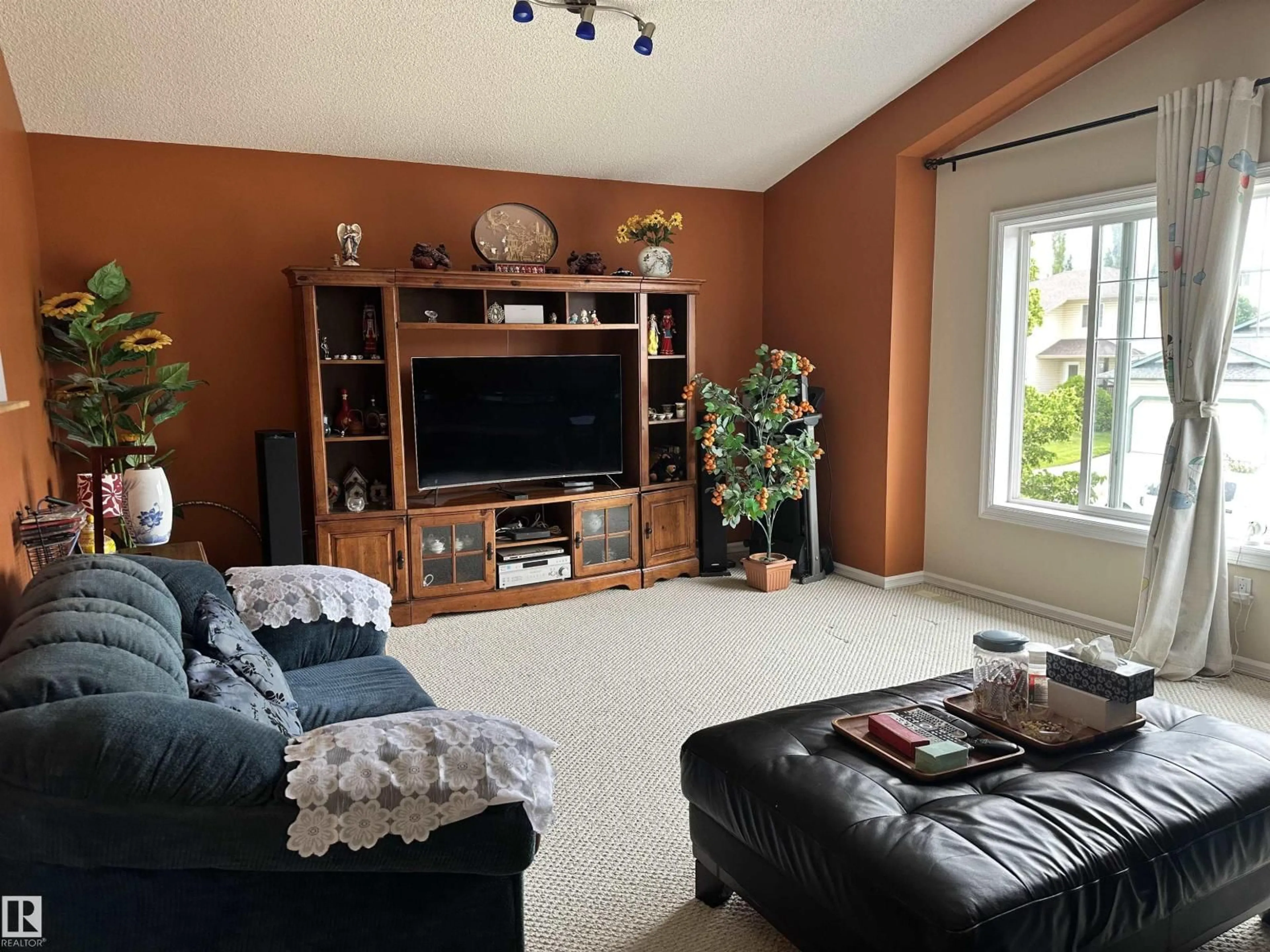 Living room with furniture, unknown for NW - 4619 151 AV, Edmonton Alberta T5Y3A1