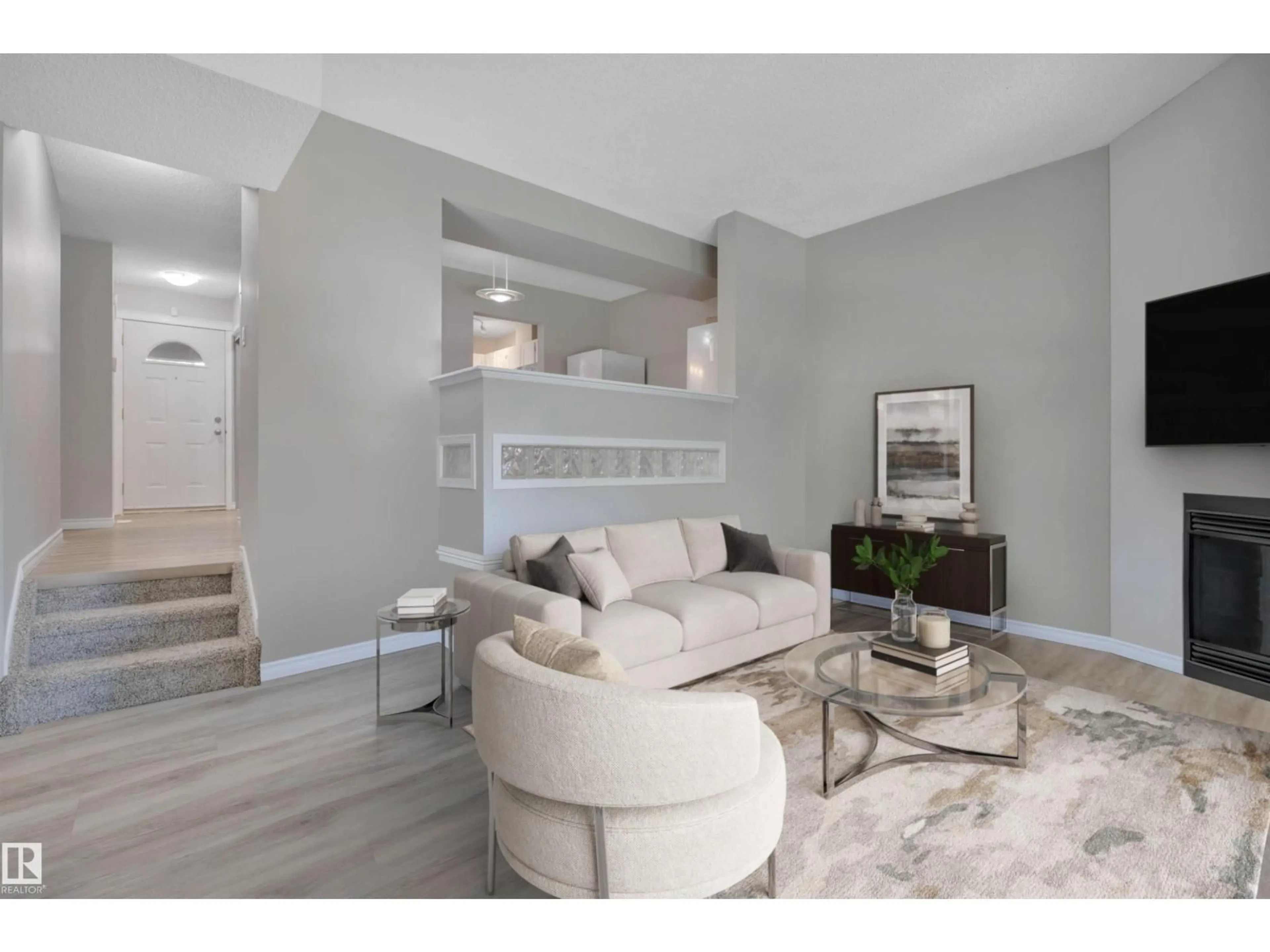 Living room with furniture, wood/laminate floor for NW - 2456 104 ST, Edmonton Alberta T6J4J8