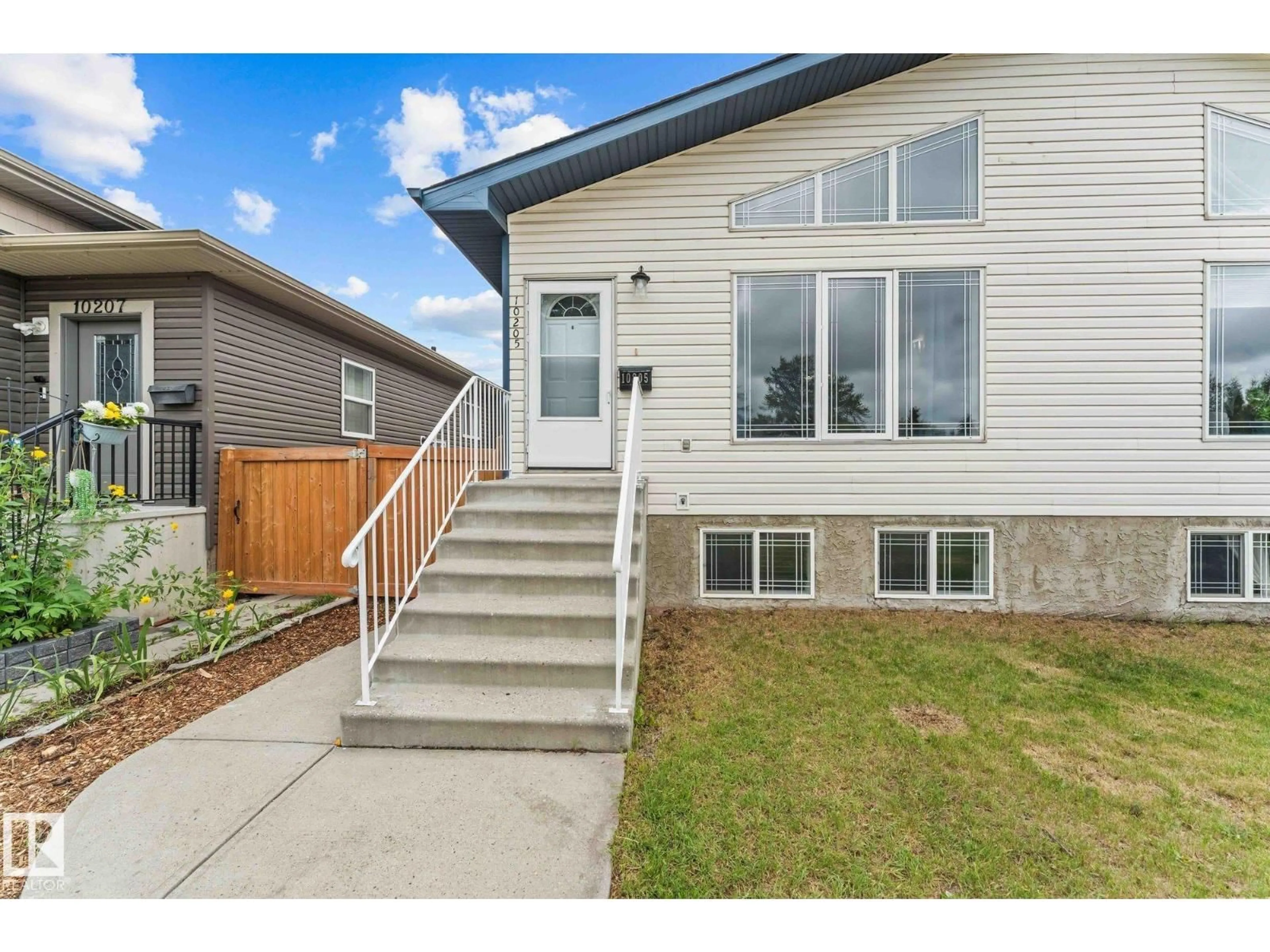 Home with vinyl exterior material, street for NW - 10205 159 ST, Edmonton Alberta T5P3A3
