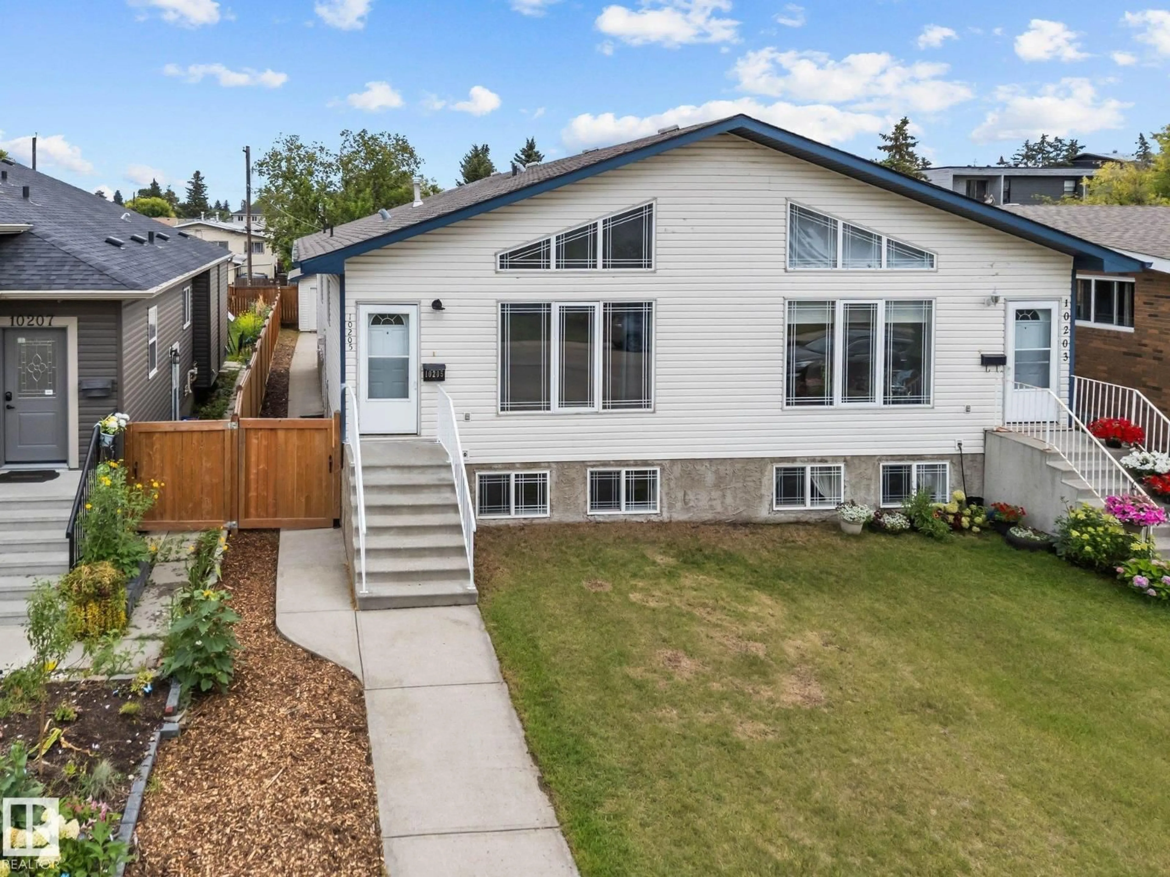 Home with vinyl exterior material, street for NW - 10205 159 ST, Edmonton Alberta T5P3A3