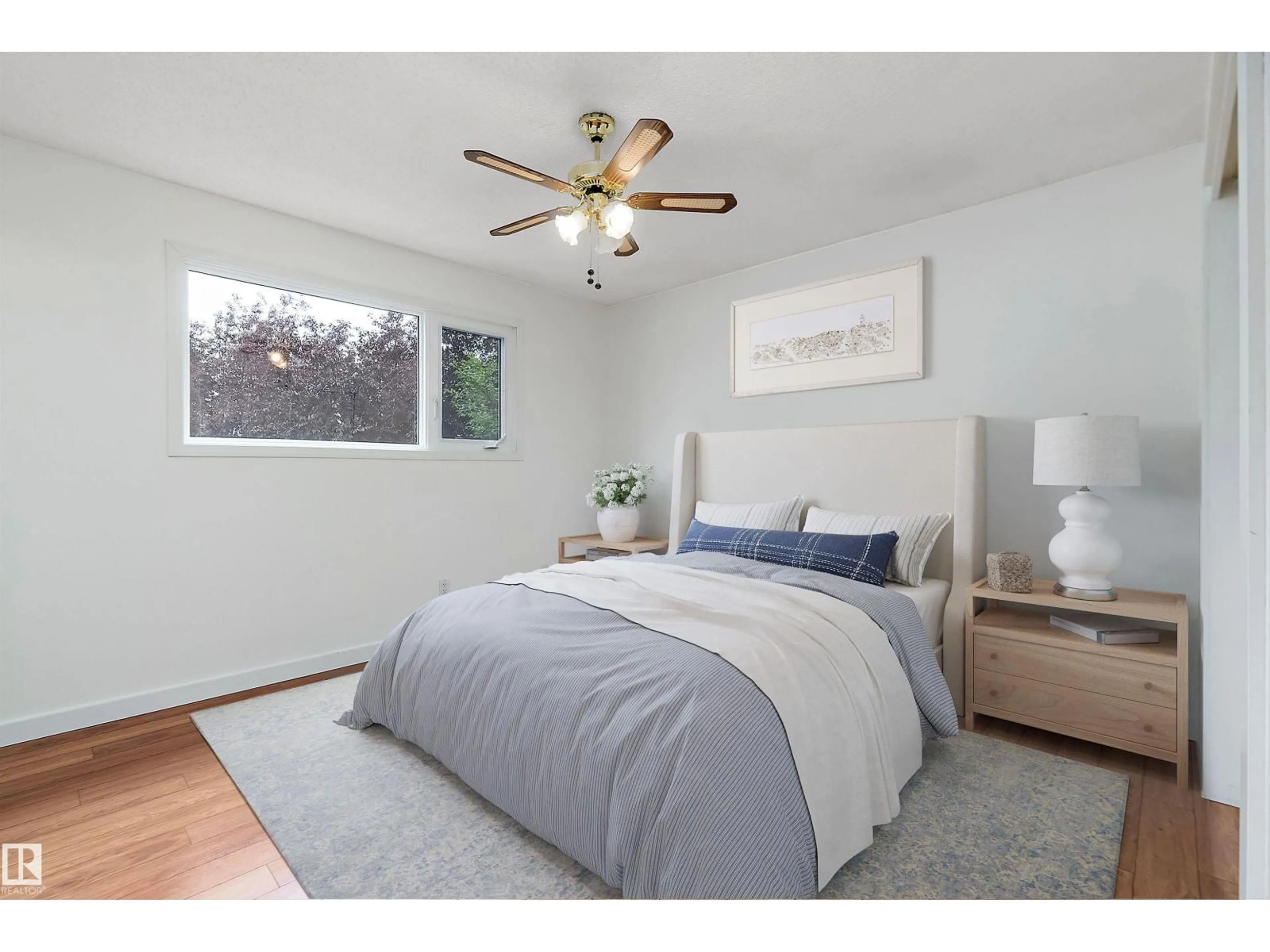 Bedroom with bed, wood/laminate floor for 5213 51A ST, Leduc Alberta T9E5L8