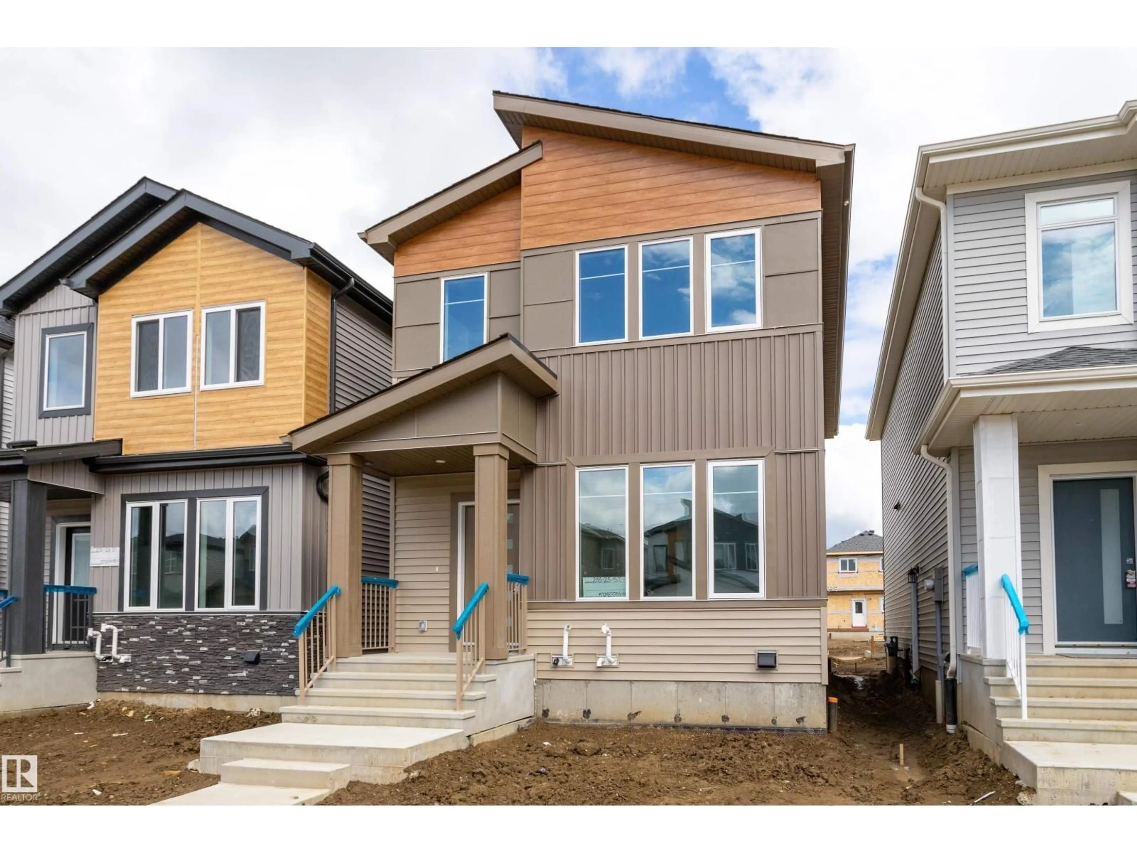 Home with vinyl exterior material, street for SW - 255 25 ST, Edmonton Alberta T6X3K3