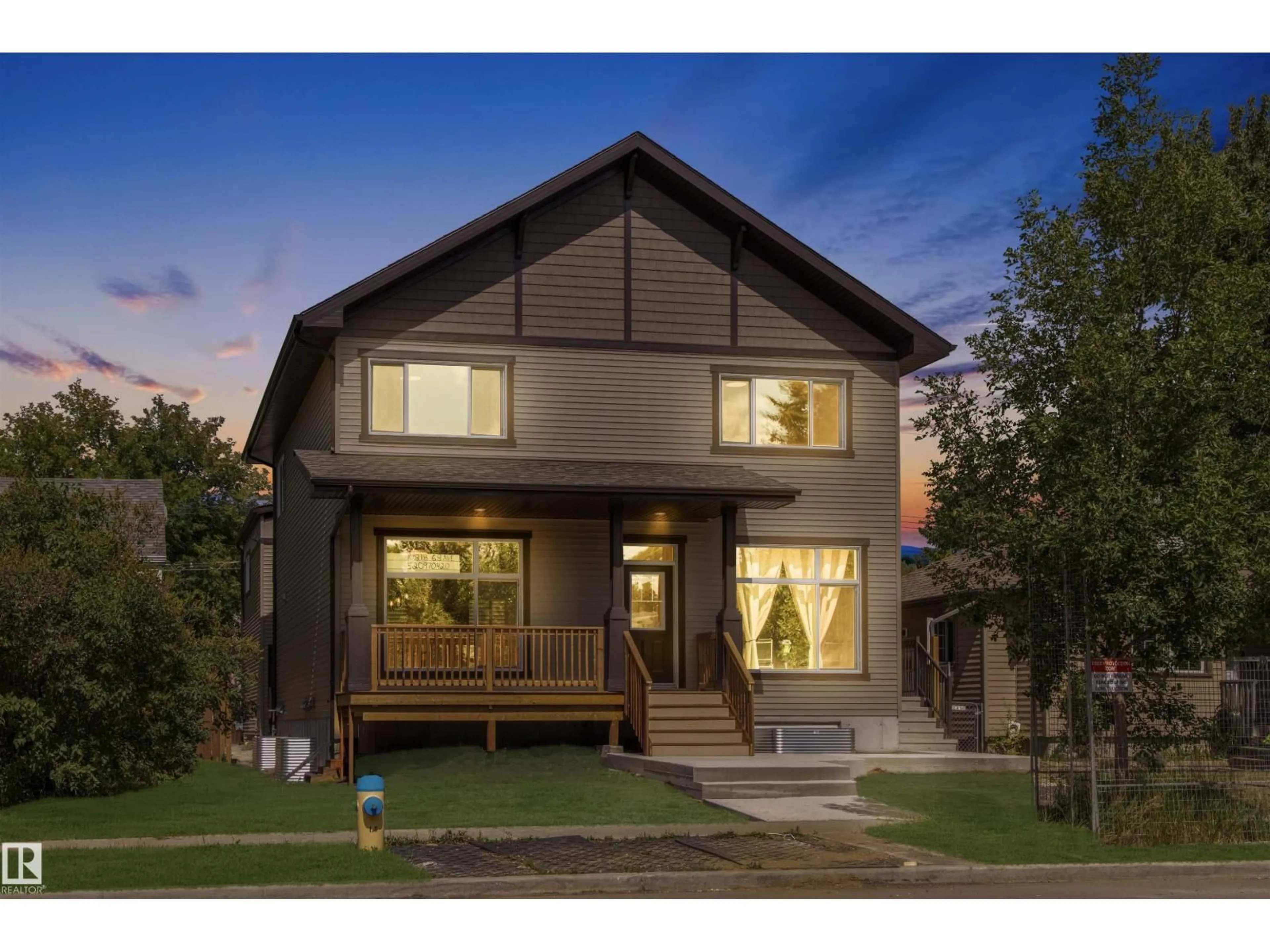 Home with brick exterior material, street for 10818 68 AV, Edmonton Alberta T6H2B8