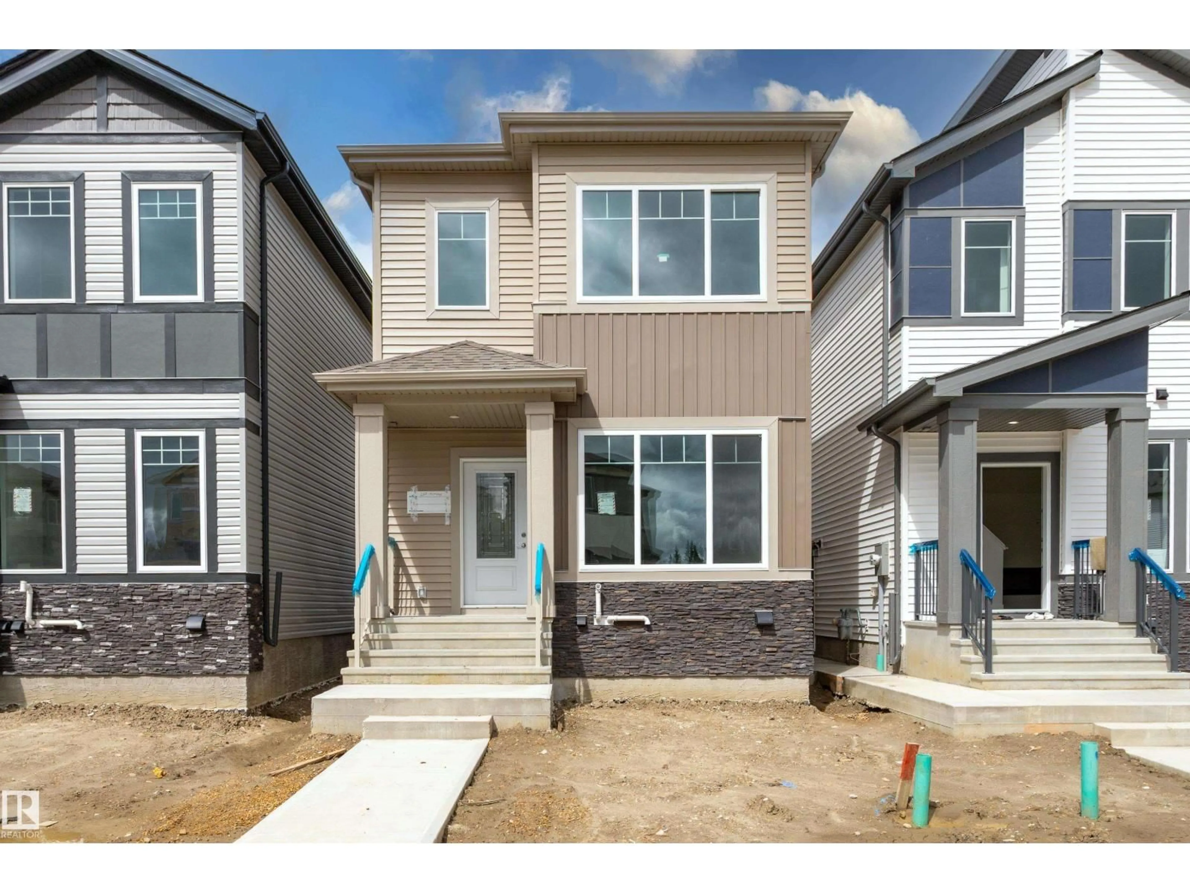 Home with vinyl exterior material, street for 265 MUNN WY, Leduc Alberta T9E0S9