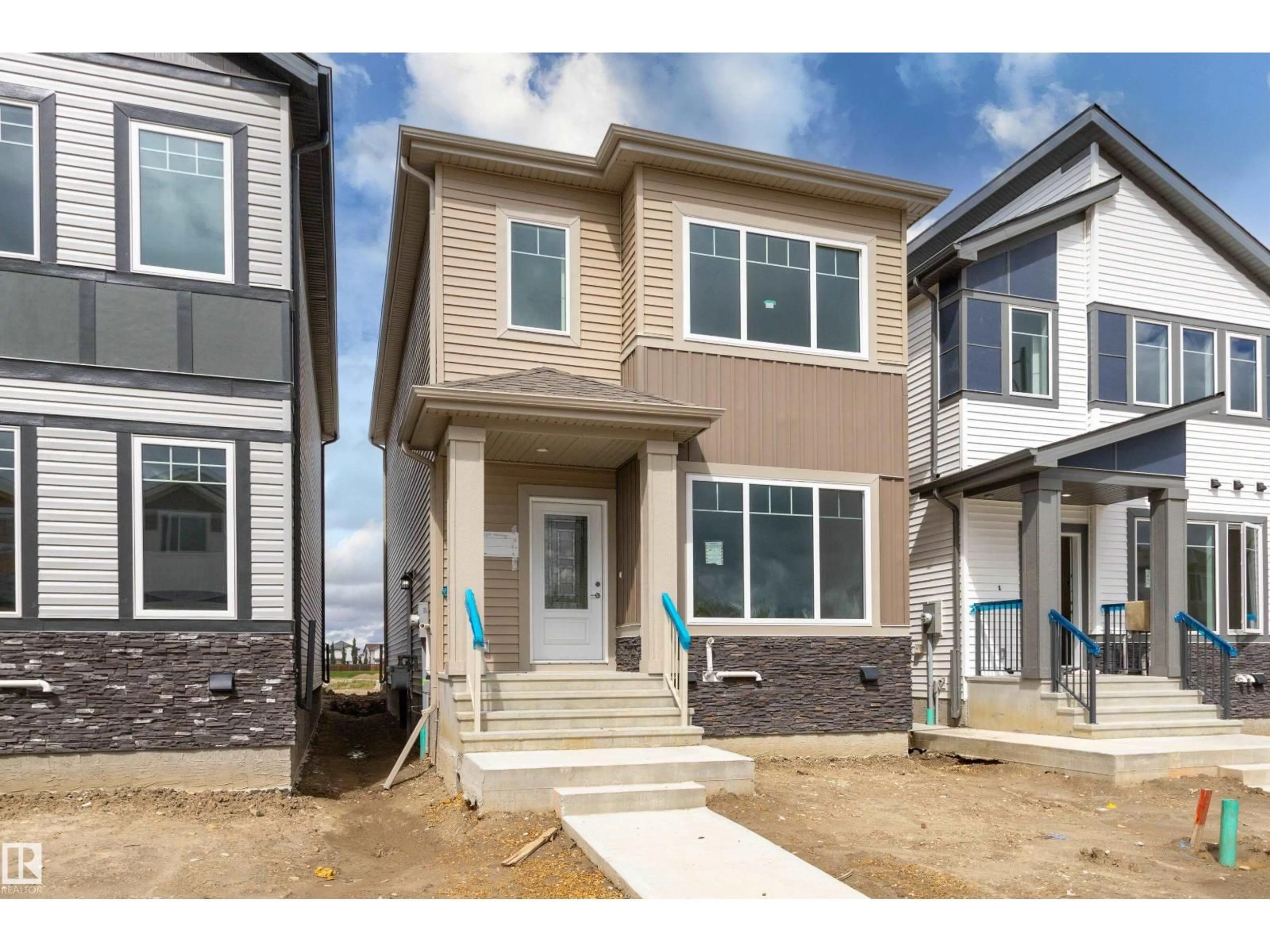 Home with vinyl exterior material, street for 265 MUNN WY, Leduc Alberta T9E0S9