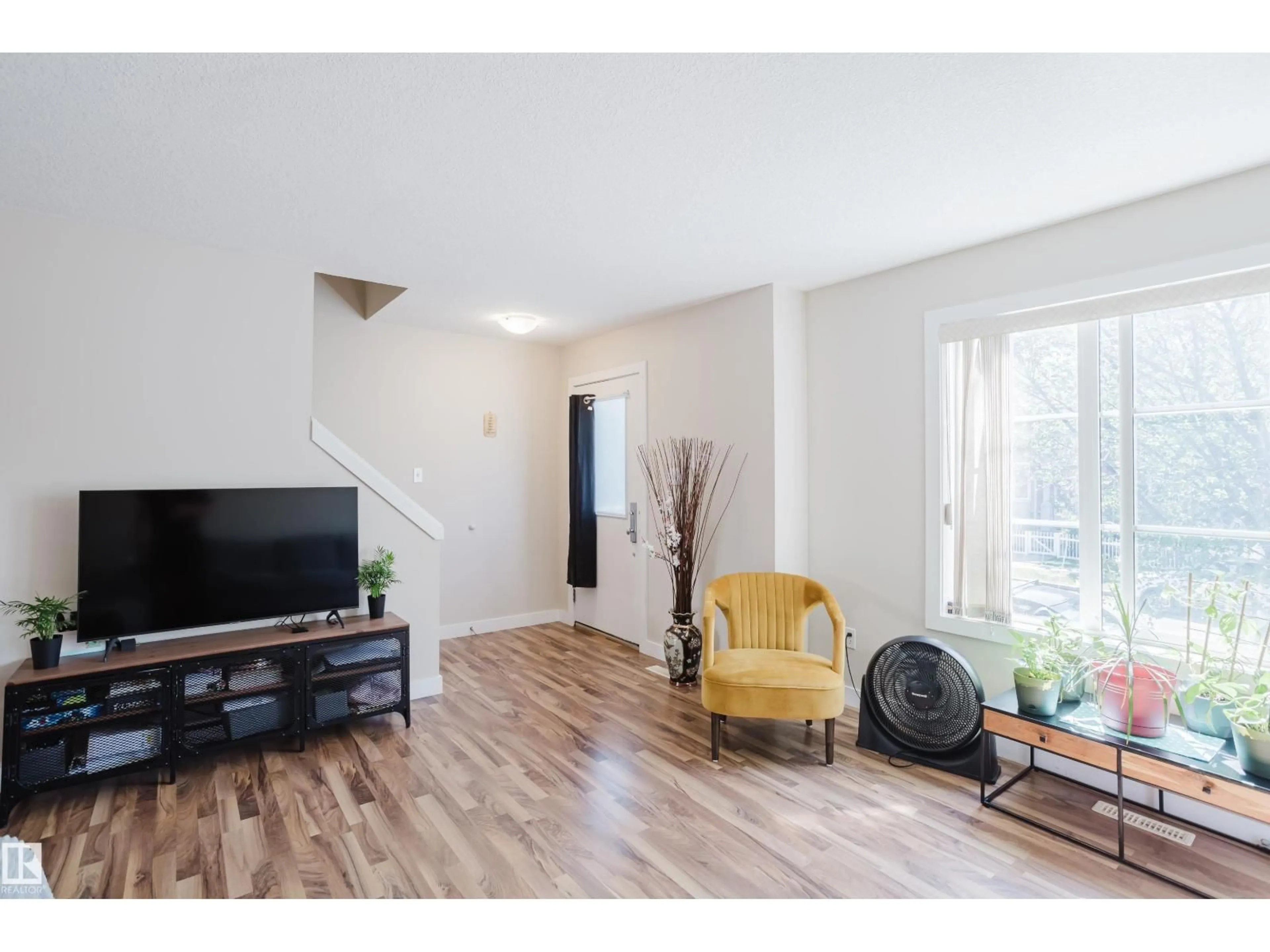 Living room with furniture, wood/laminate floor for #11 - 5260 TERWILLEGAR BV, Edmonton Alberta T6R0S1