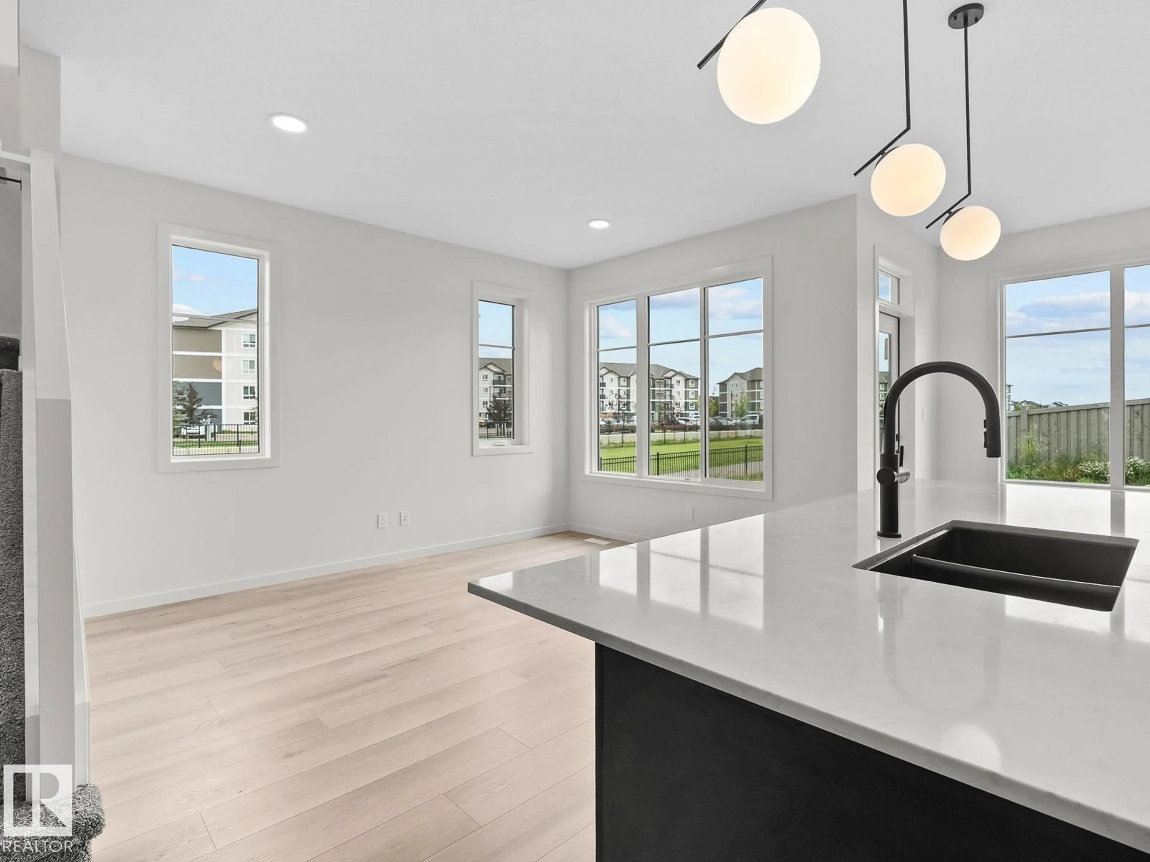 Open concept kitchen, unknown for NW - 8219 227 ST, Edmonton Alberta T5T4N5