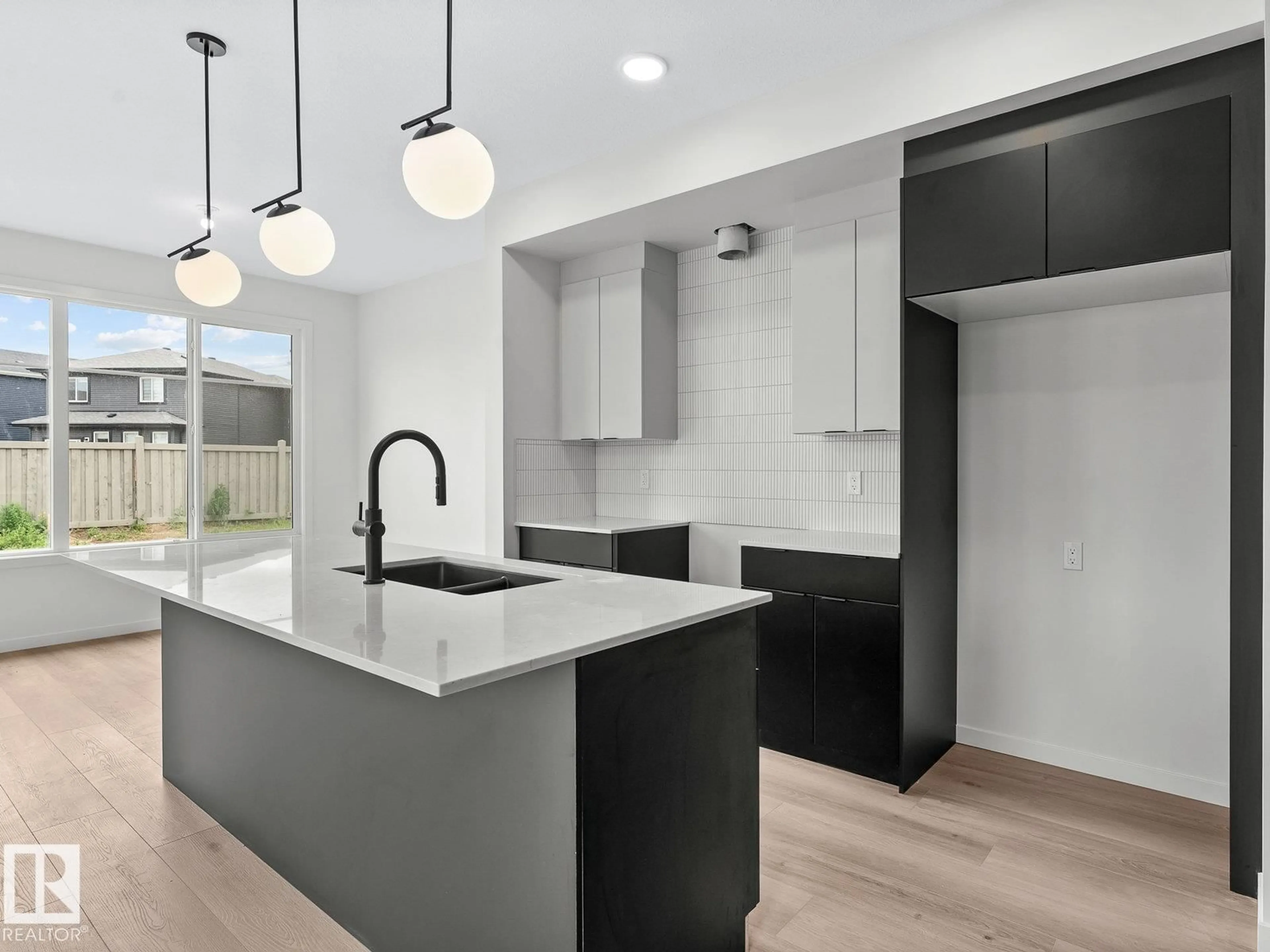 Open concept kitchen, unknown for NW - 8219 227 ST, Edmonton Alberta T5T4N5
