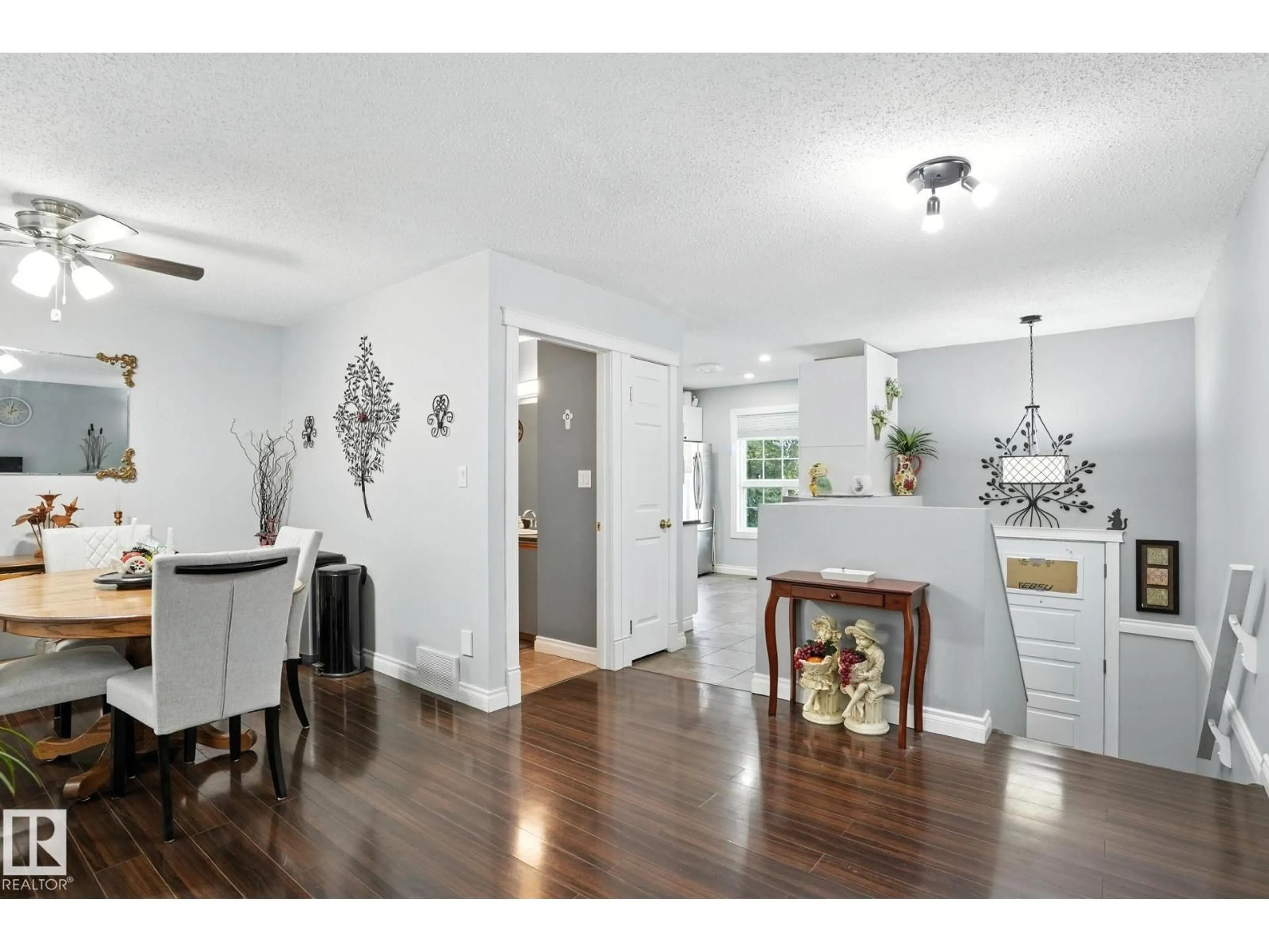 Open concept kitchen, wood/laminate floor for #3 - 4630 17 AV, Edmonton Alberta T6L6H3