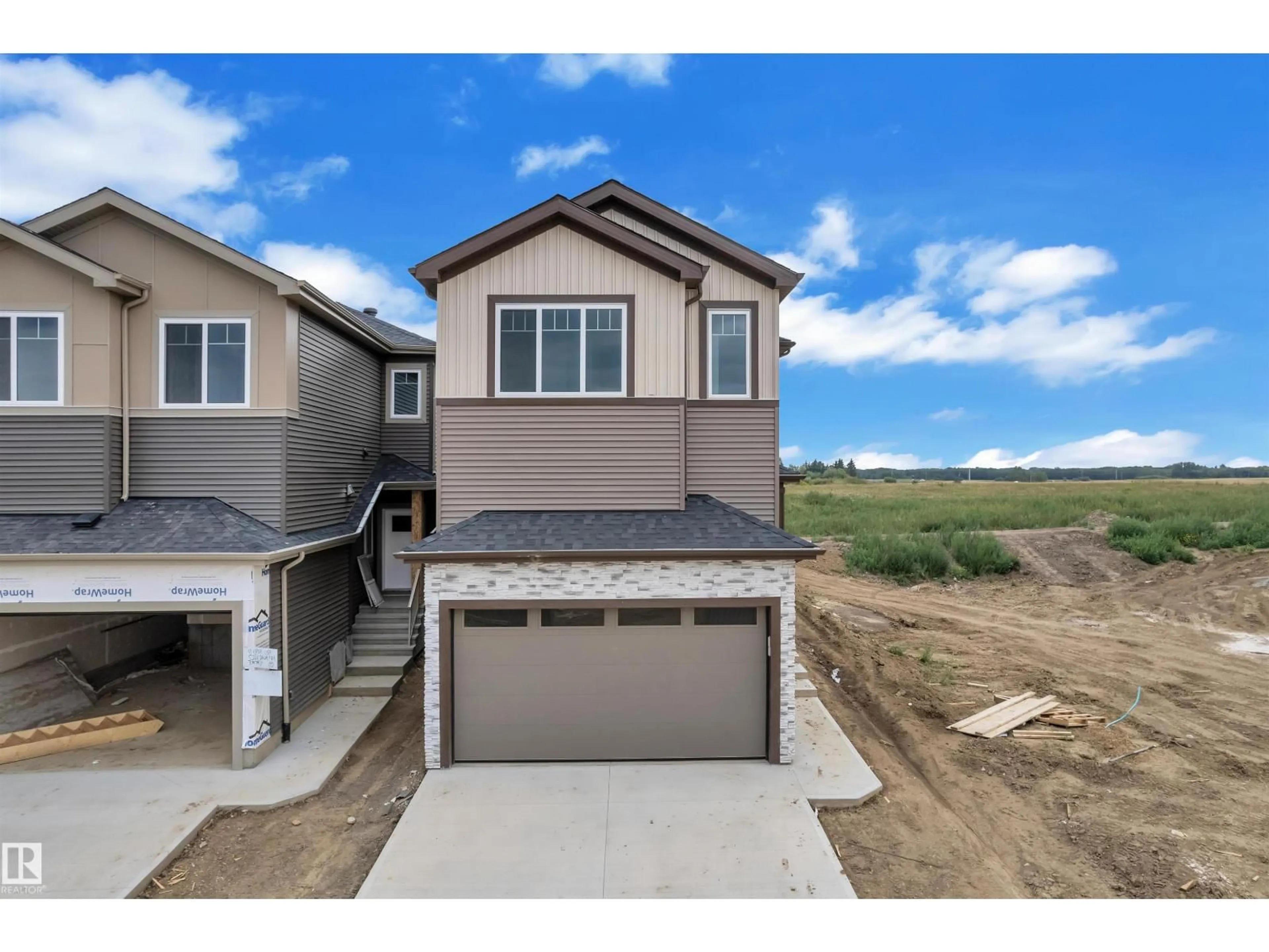 Home with vinyl exterior material, street for 22839 80 AV, Edmonton Alberta T5T7X8