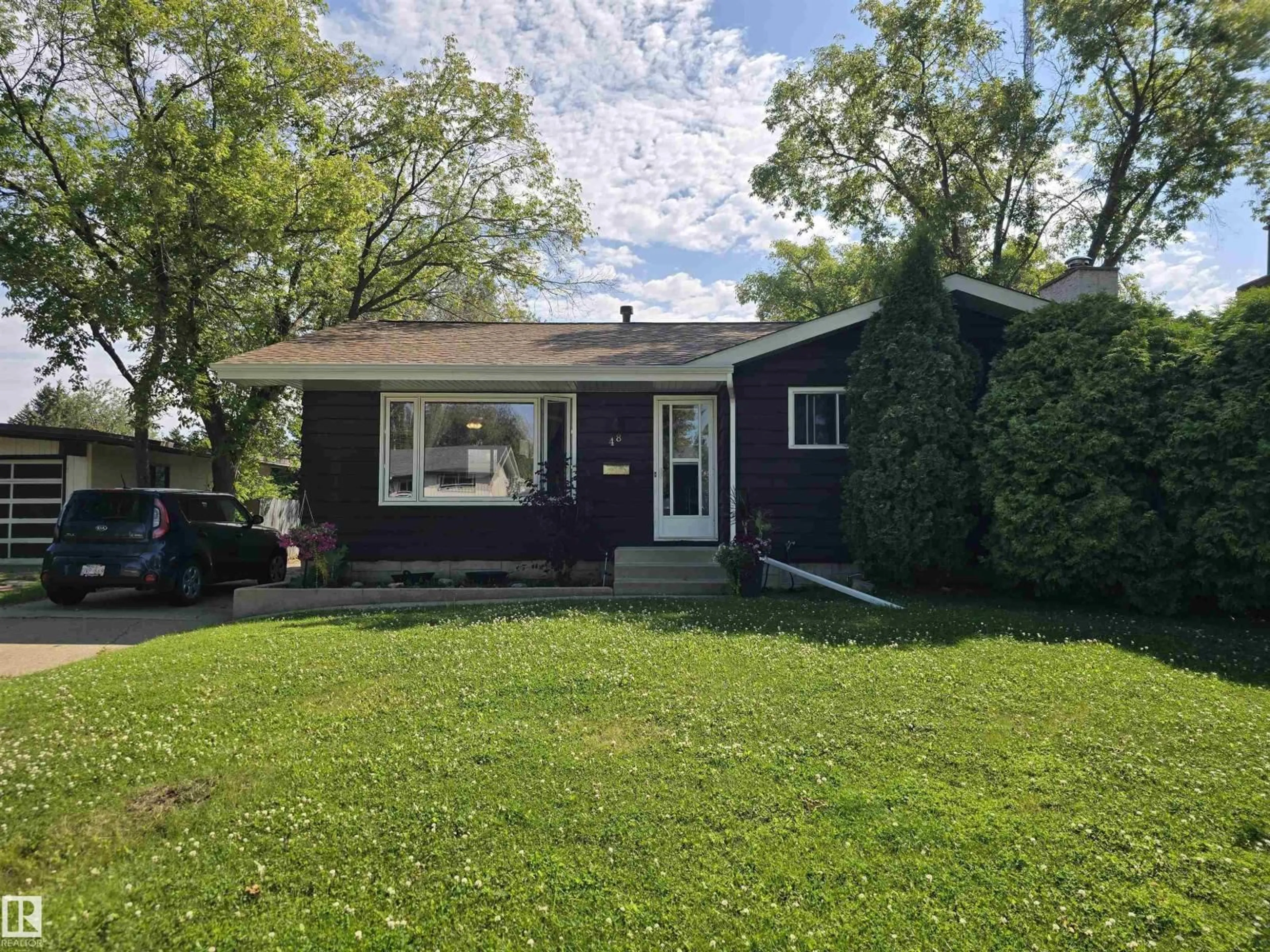 Home with vinyl exterior material, street for 48 MEADOWOOD CR, Sherwood Park Alberta T8A0L7