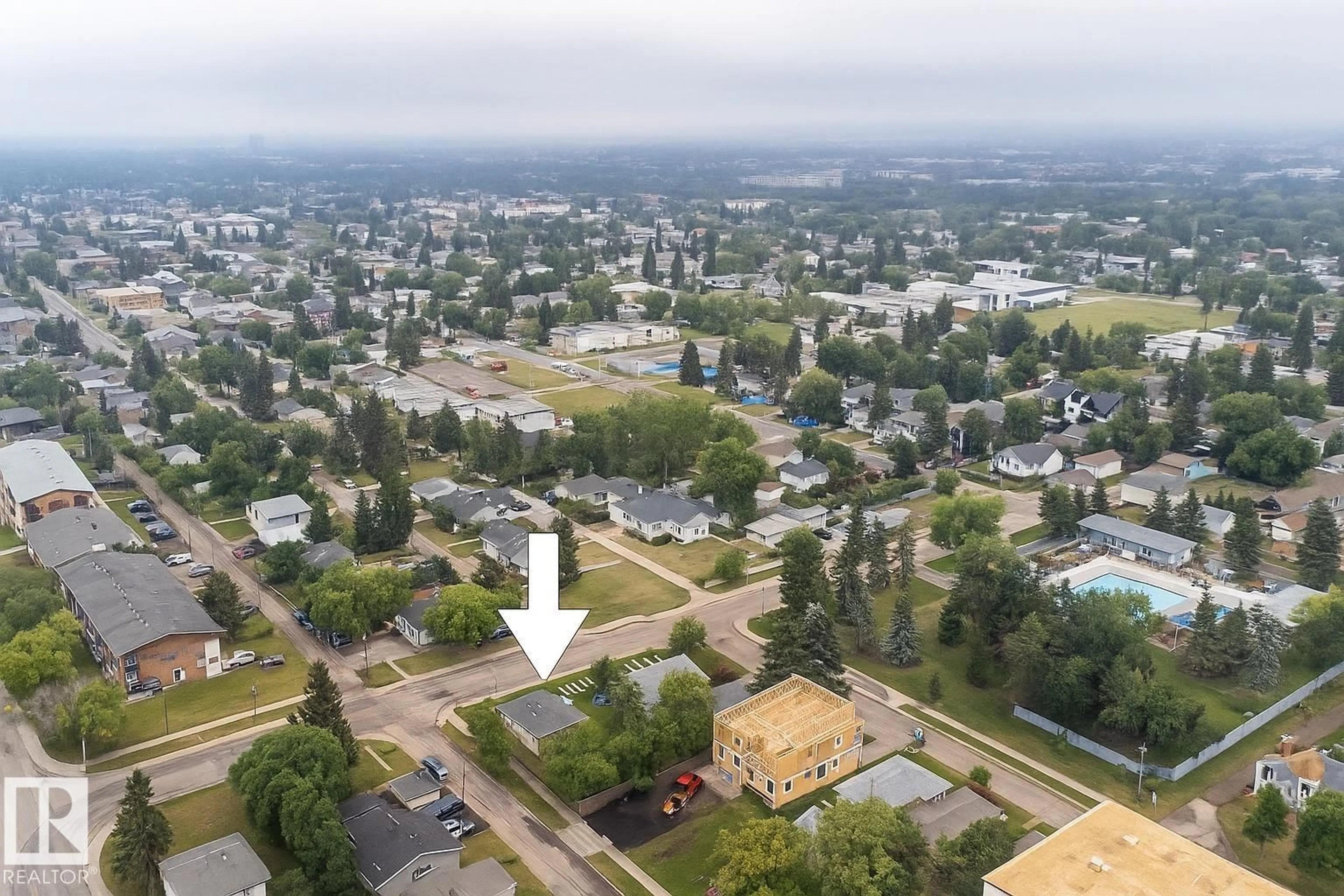 A pic from outside/outdoor area/front of a property/back of a property/a pic from drone, unknown for 15630 105 AV, Edmonton Alberta T5P0V5