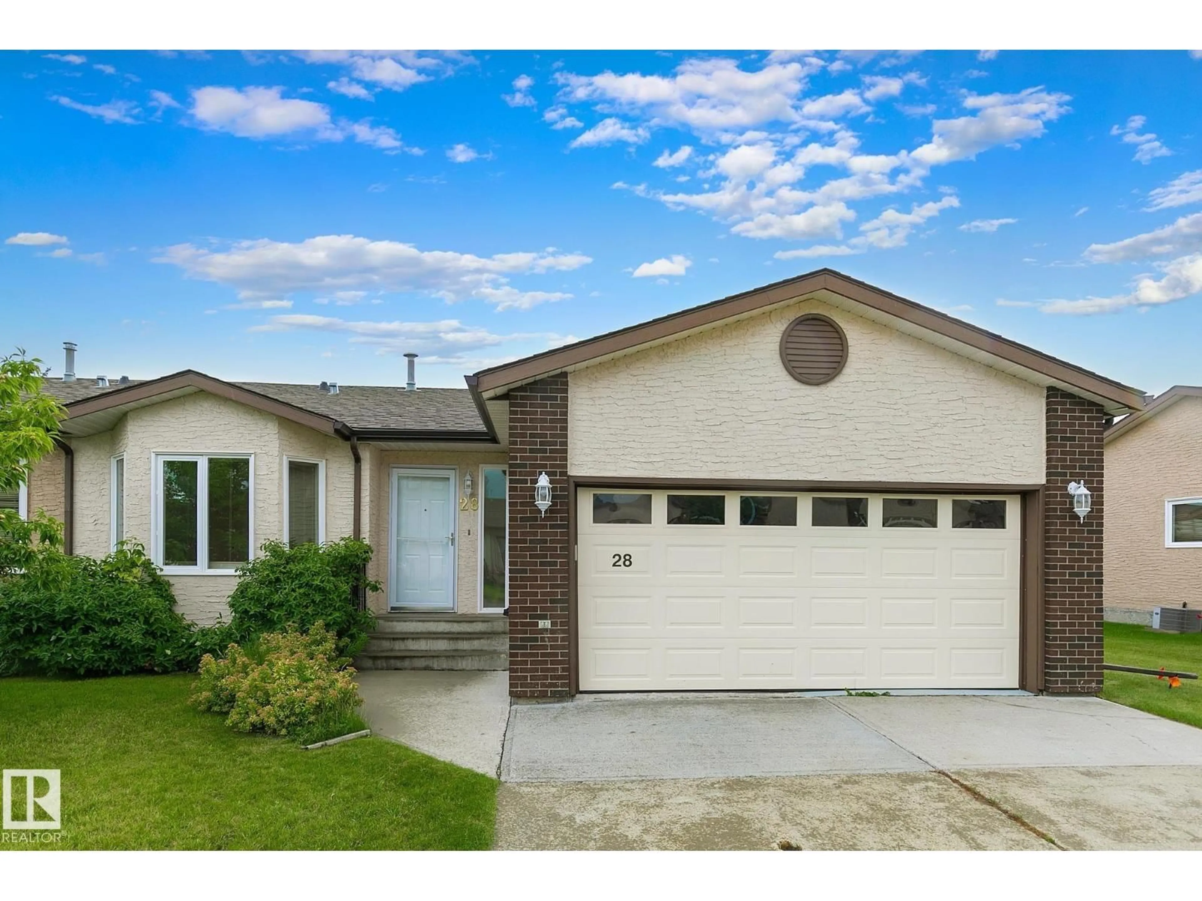 Home with vinyl exterior material, street for 28 SUNRISE VG, Stony Plain Alberta T7Z1L2