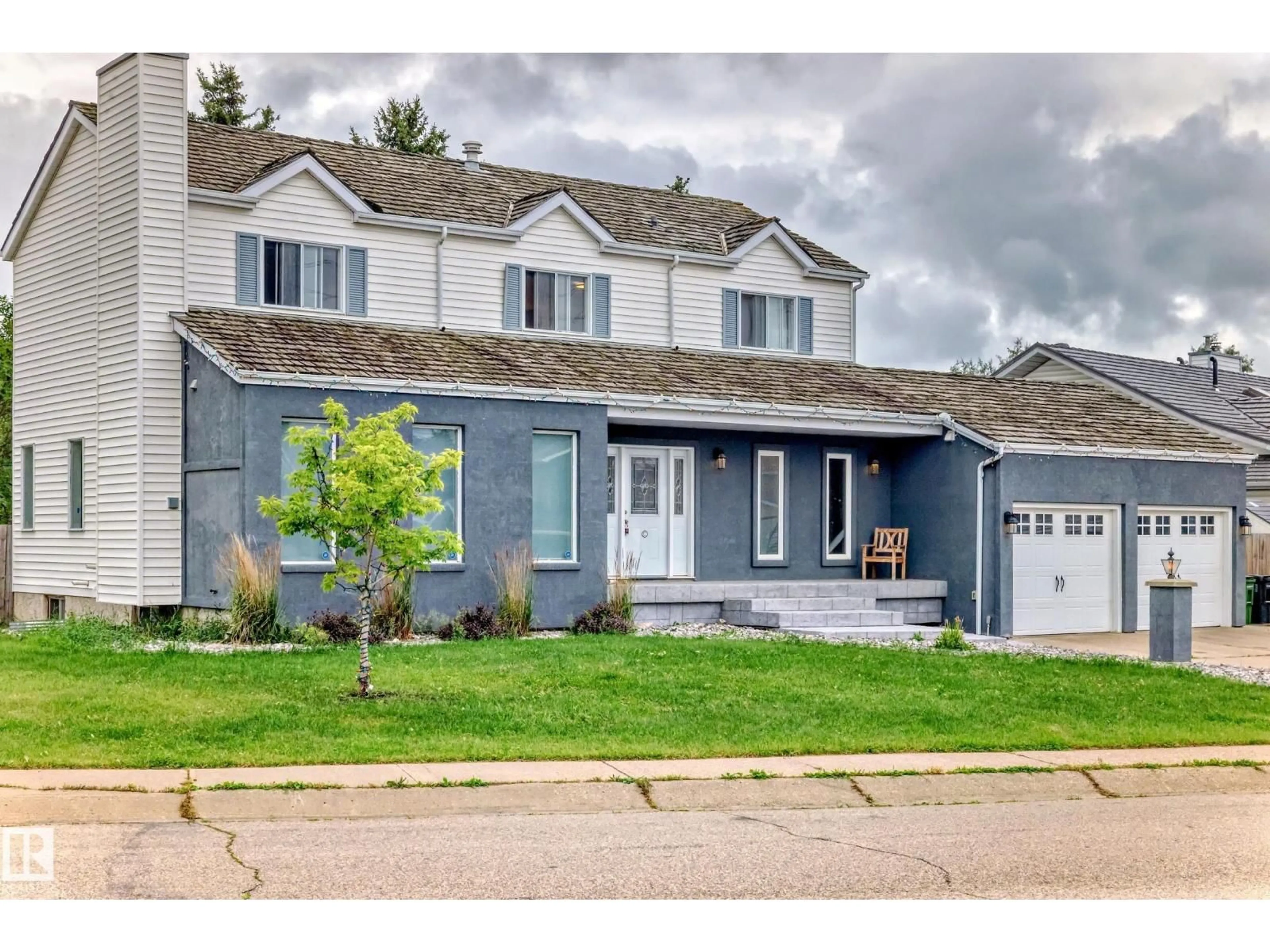 Home with vinyl exterior material, street for 12403 29A AV, Edmonton Alberta T6J6C7