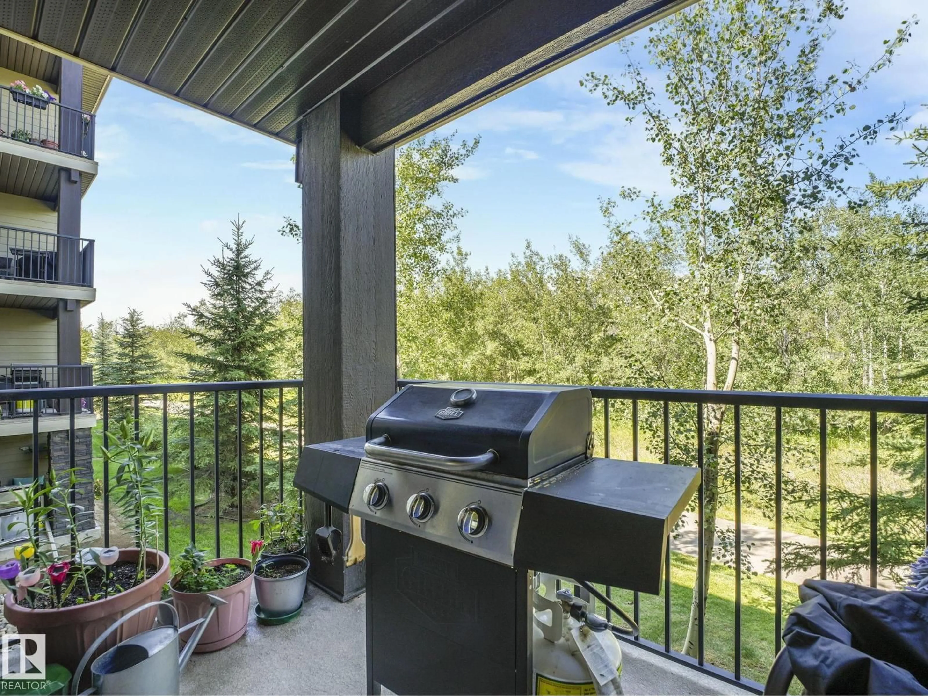 Patio, forest/trees view for 1070 - 210 MCCONACHIE BV, Edmonton Alberta T5Y0X1